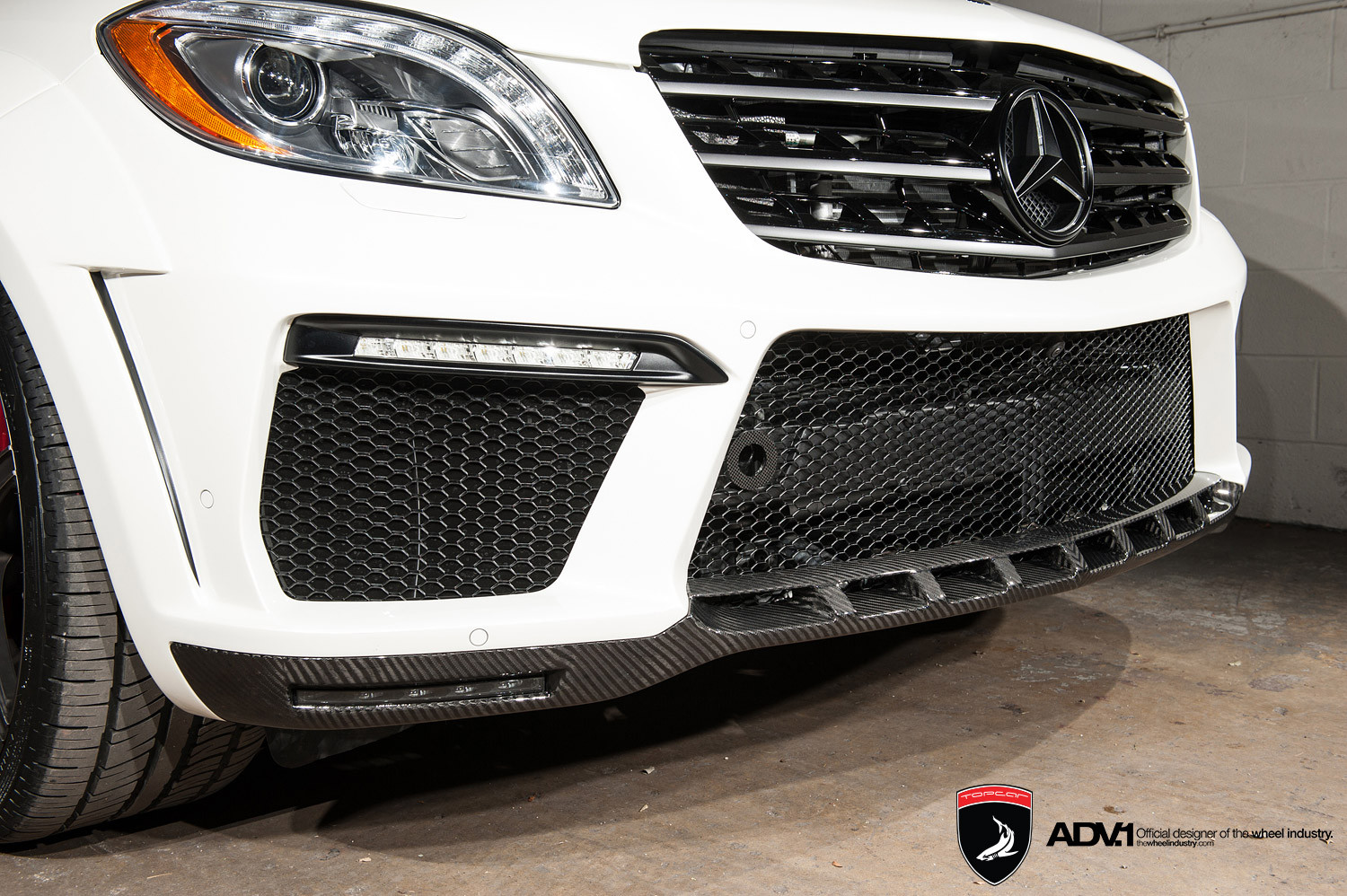 Carbon Fiber Front Bumper Lip On Mercedes M-Class - Photo by ADV.1