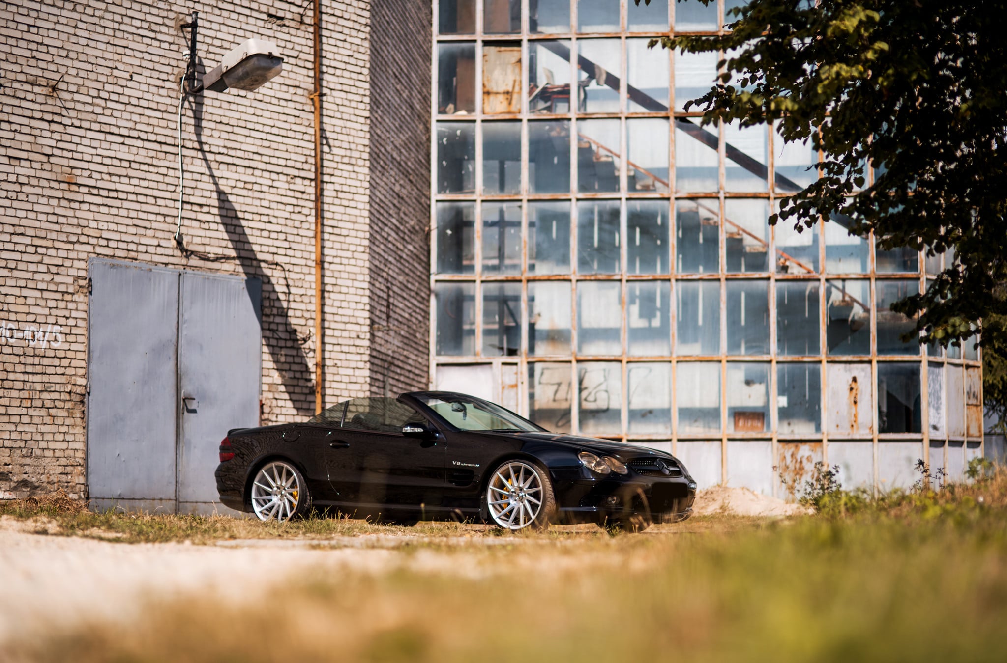 Custom Side Skirts on Black Convertible Mercedes SL Class - Photo by JR Wheels