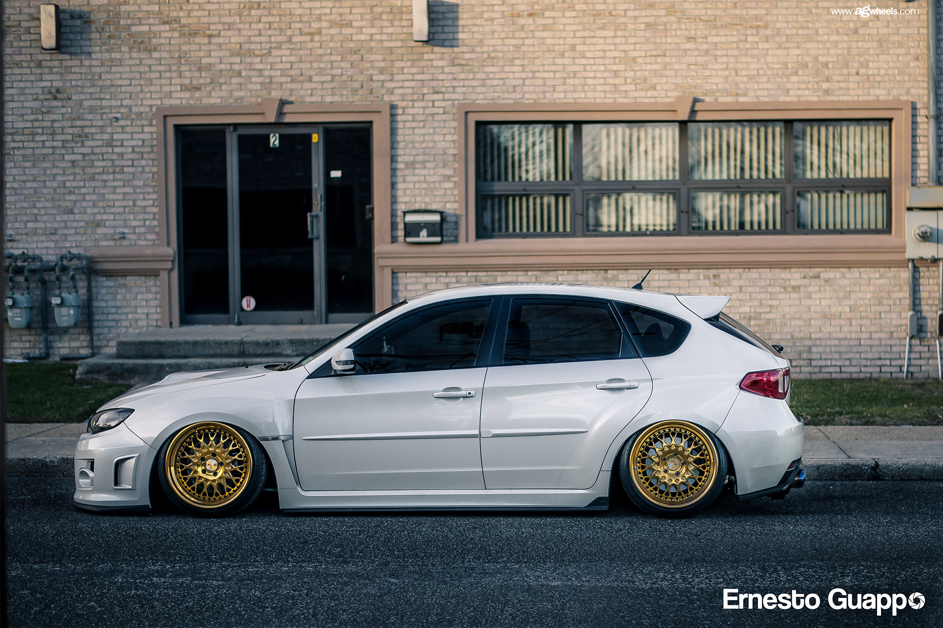 White Mitsubishi Evolution with Aftermarket Side Skirts - Photo by Avant Garde Wheels