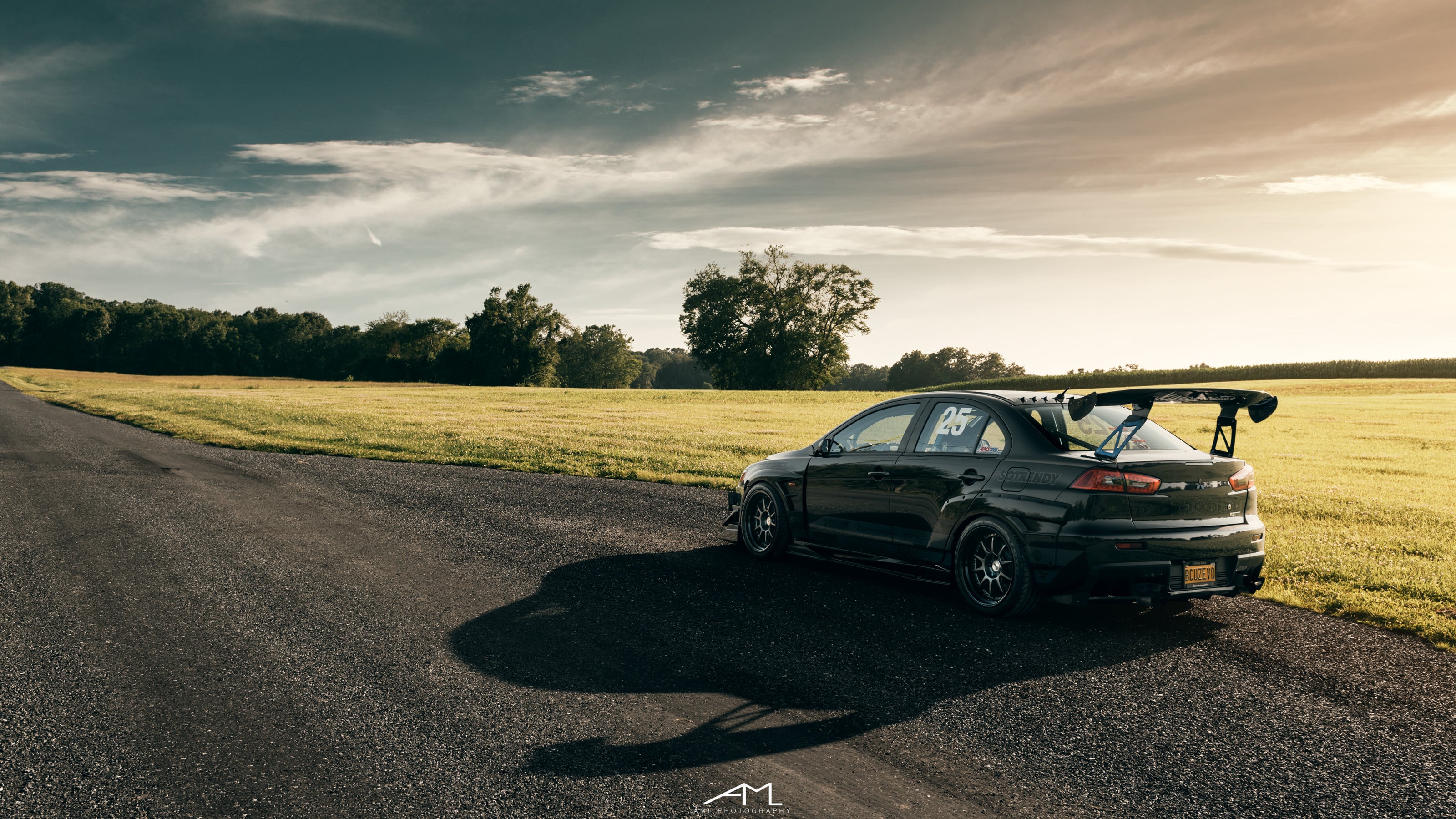 Black Mitsubishi Evolution with Aftermarket Rear Diffuser - Photo by Arlen Liverman