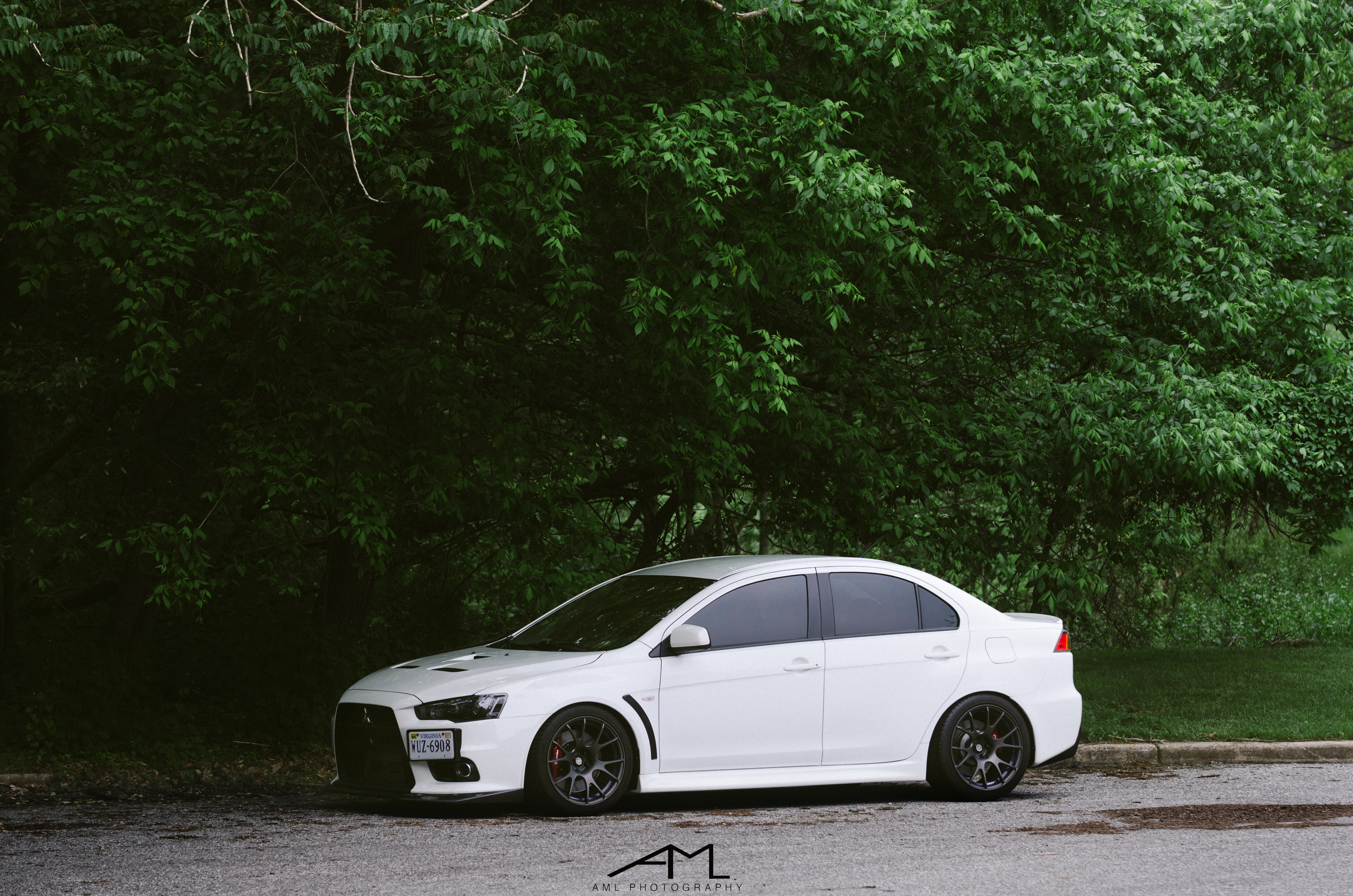 Custom White Mitsubishi Evolution Side Skirts - Photo by Arlen Liverman