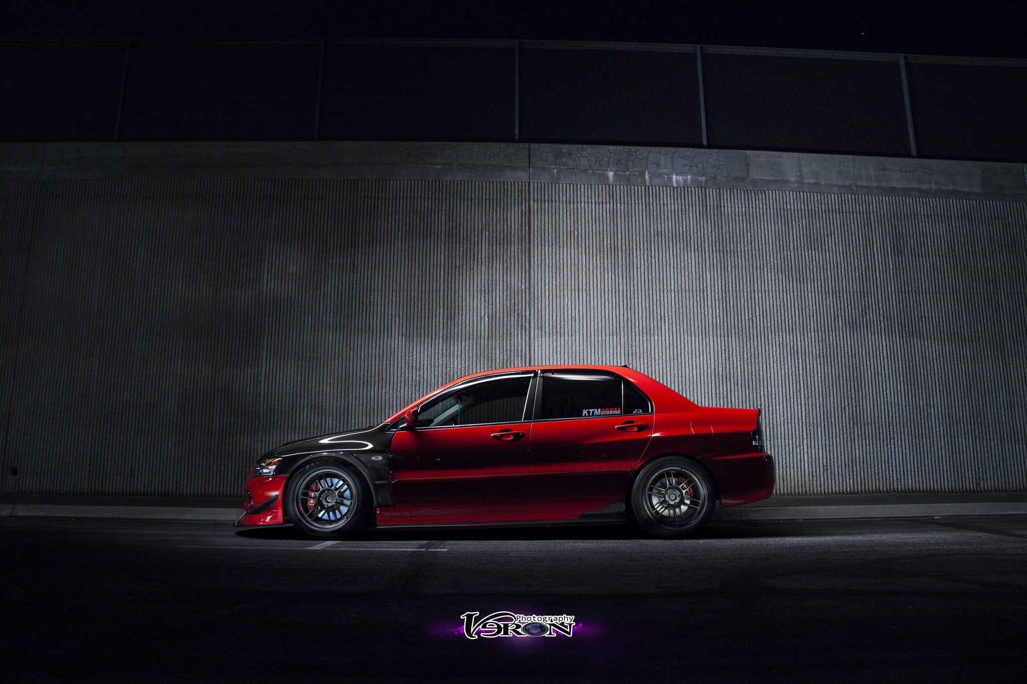 Aftermarket Side Skirts on Red Mitsubishi Evolution - Photo by Manuel Veron