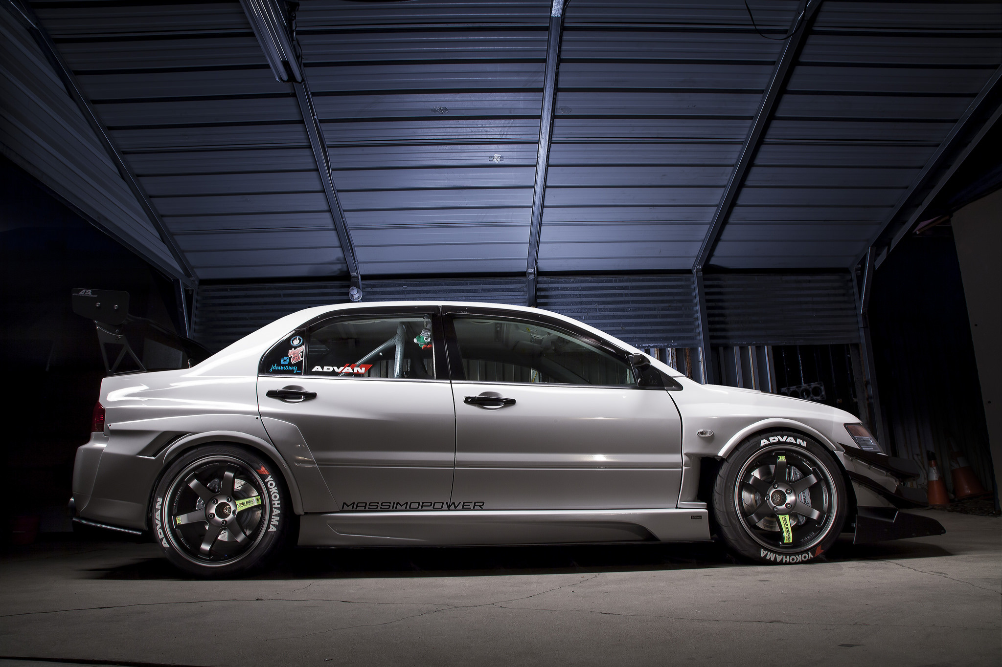 White Mitsubishi Evolution on Yokohama Advan Tires  - Photo by Manuel Veron