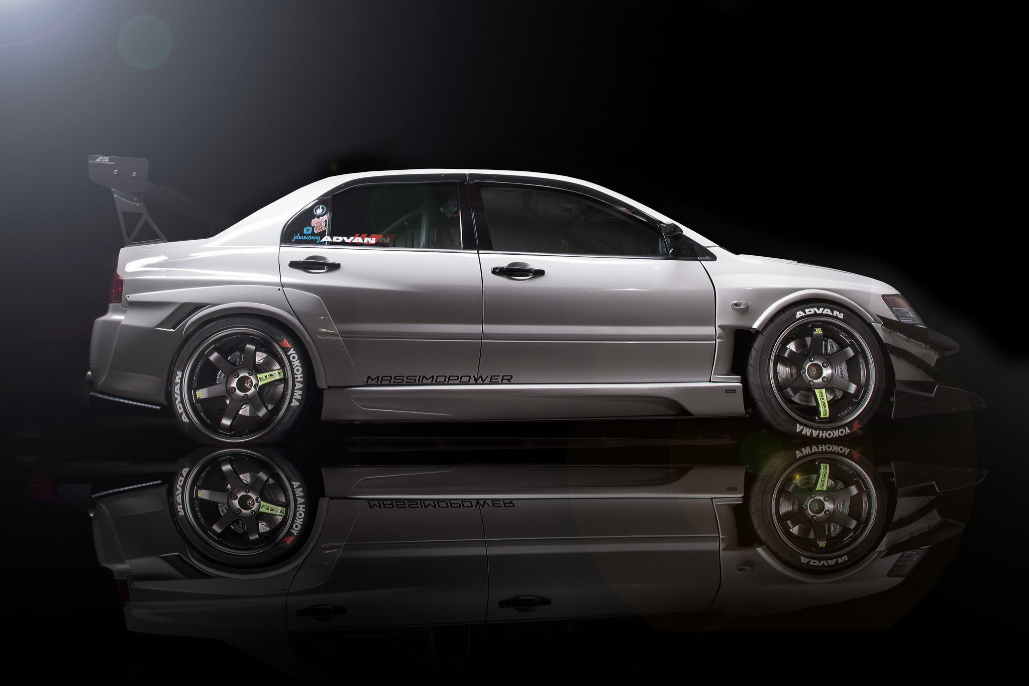 Aftermarket Side Skirts on White Mitsubishi Evolution - Photo by Manuel Veron