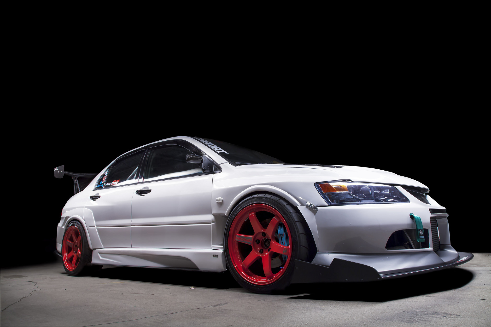 Custom Front Bumper Lip Spoiler on White Mitsubishi Evolution - Photo by Manuel Veron