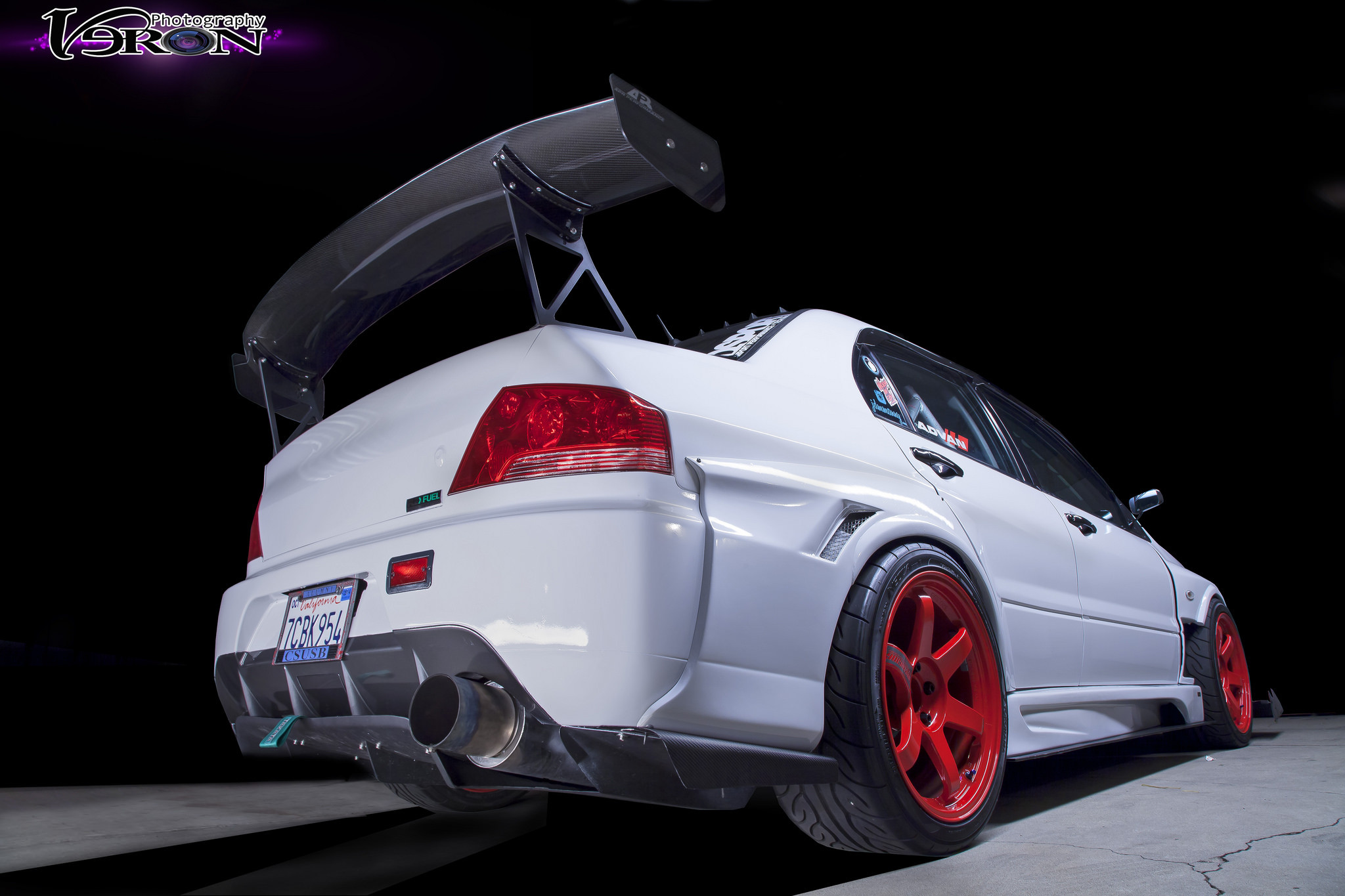 White Mitsubishi Evolution with Aftermarket Rear Diffuser - Photo by Manuel Veron