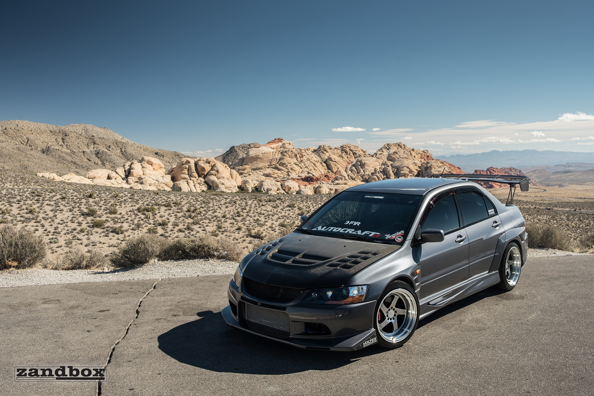Carbon Fiber Hood on Gray Mitsubishi Evolution - Photo by zandbox
