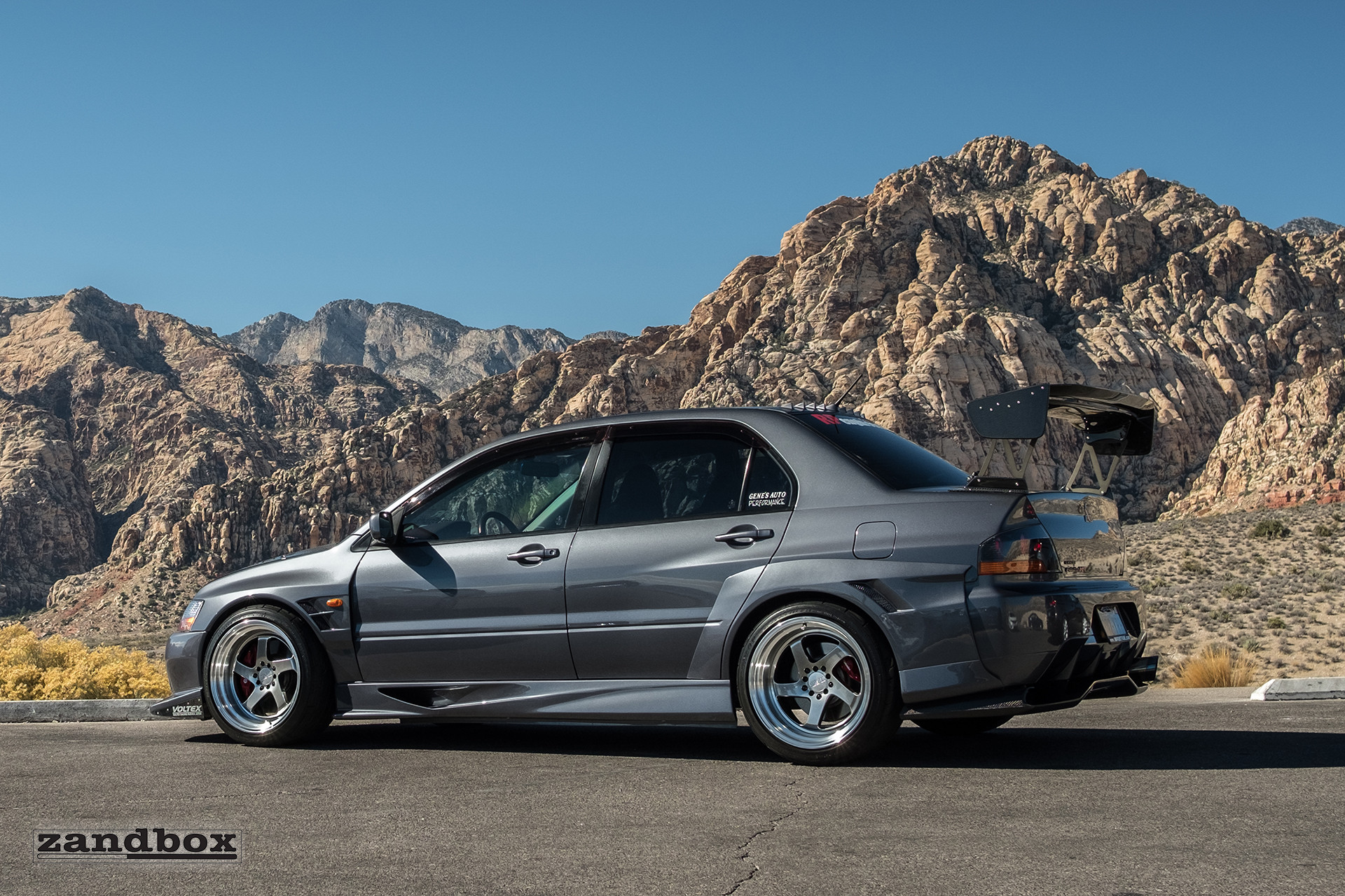 Aftermarket Side Skirts on Gray Mitsubishi Evolution - Photo by zandbox