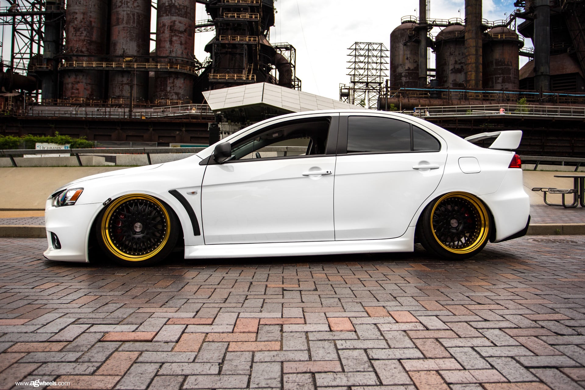 Black Rims With Gold Lips on Lancer EVO X - Photo by Avant Garde