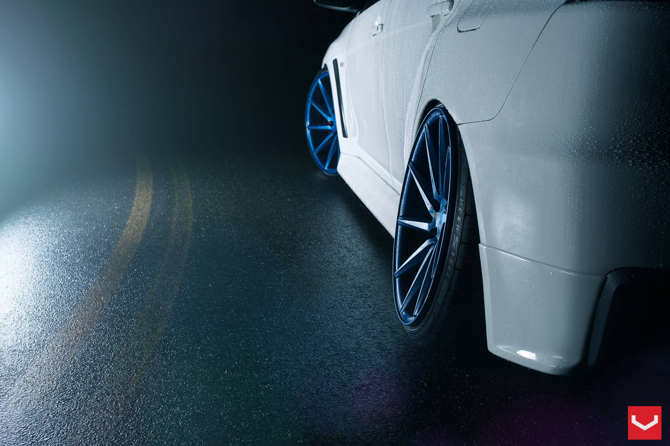 Blue CVT Vossen Wheels on White Mitsubishi Evolution - Photo by Vossen