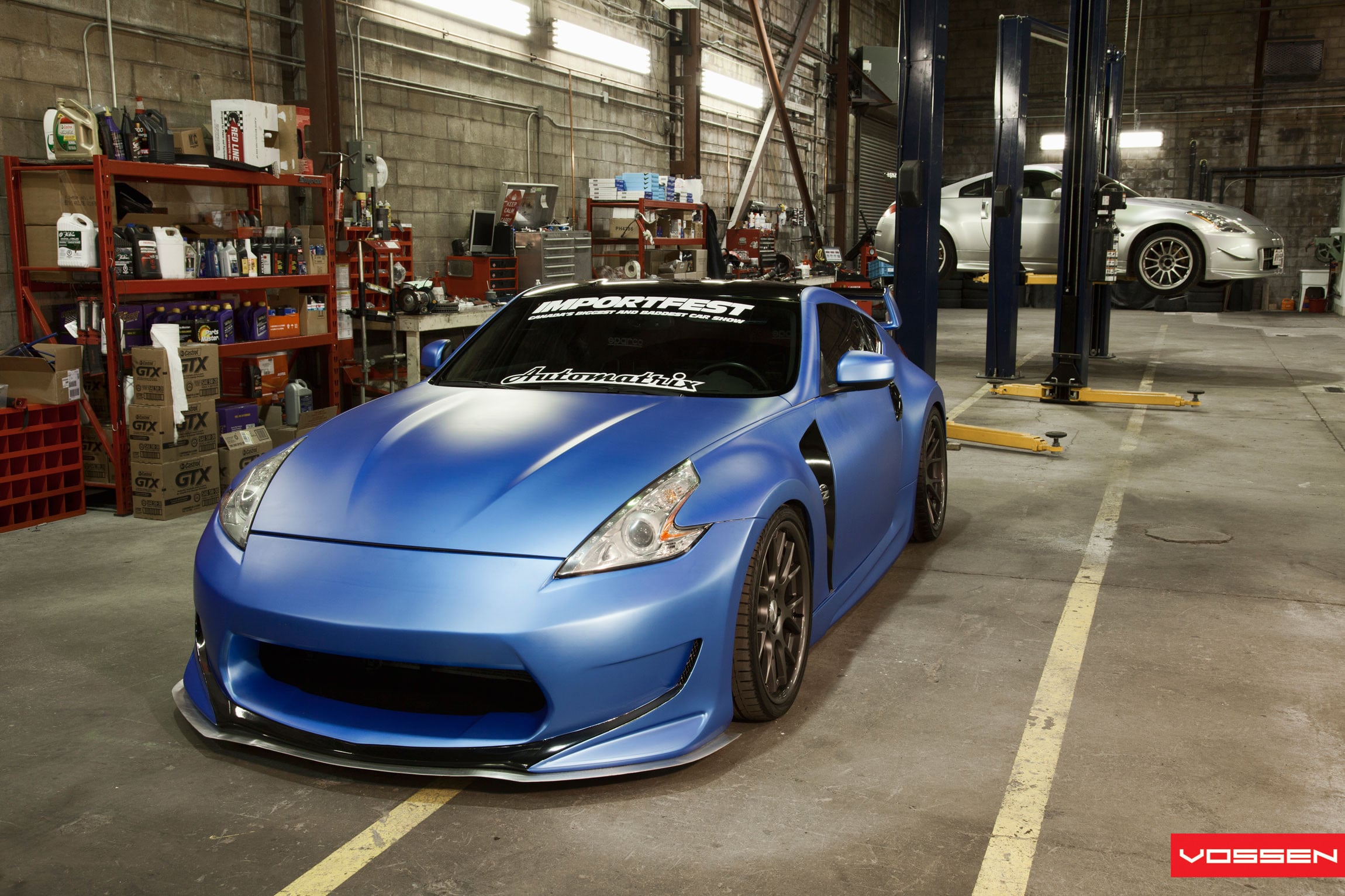 Aftermarket Front Bumper Spoiler on Blue Nissan 370Z - Photo by Vossen