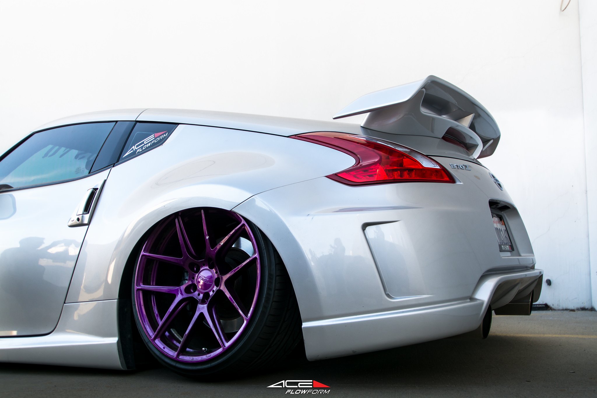 White Nissan 370Z with Aftermarket Rear Bumper - Photo by Ace Alloy.