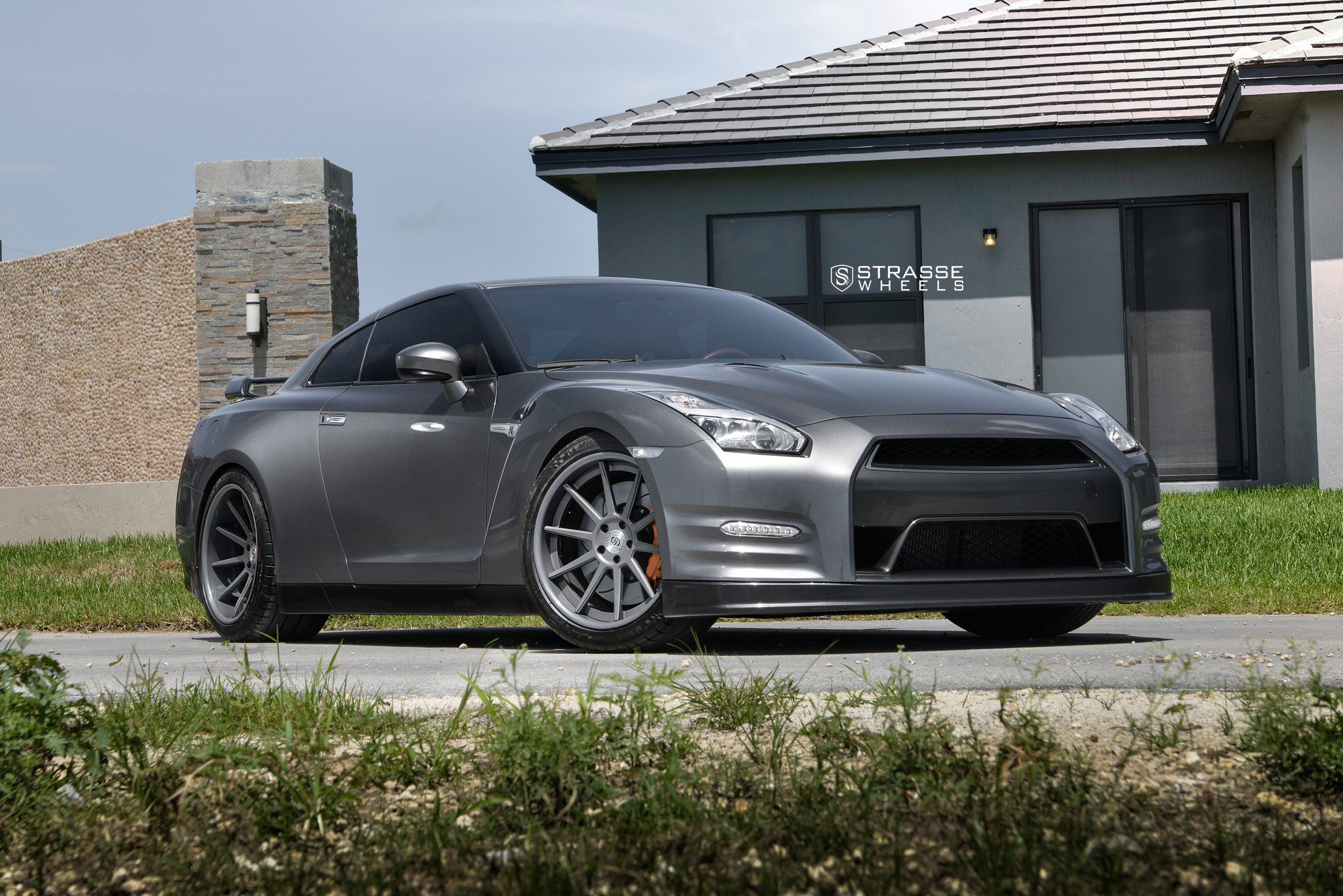 Bold Custom Gray Nissan GT-R with Matte Gunmetal Strasse Wheels on.