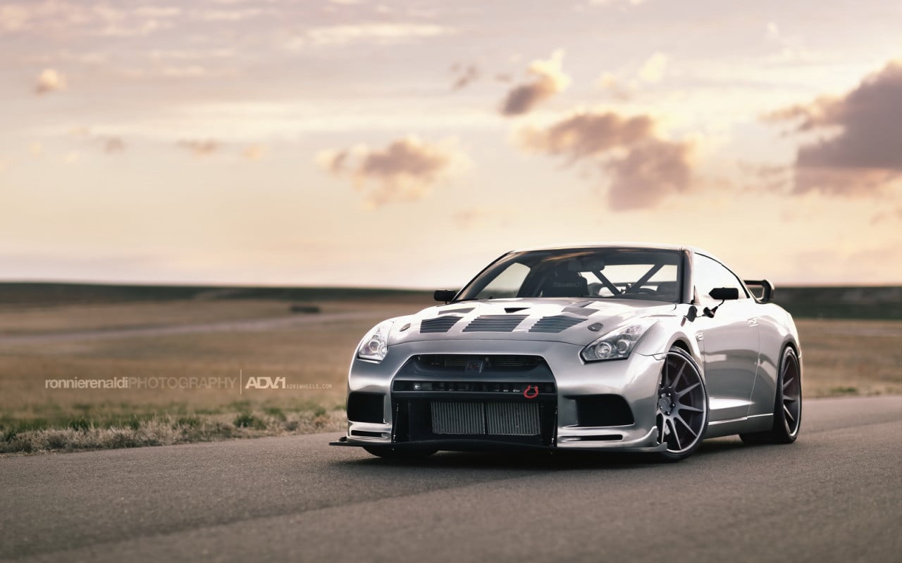 Silver Nissan GT-R with Aftermarket Hood - Photo by ADV.1