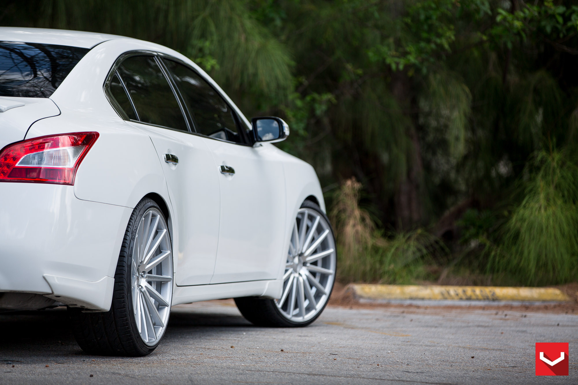 White Nissan Maxima on Chrome VFS Vossen Wheels - Photo by Vossen