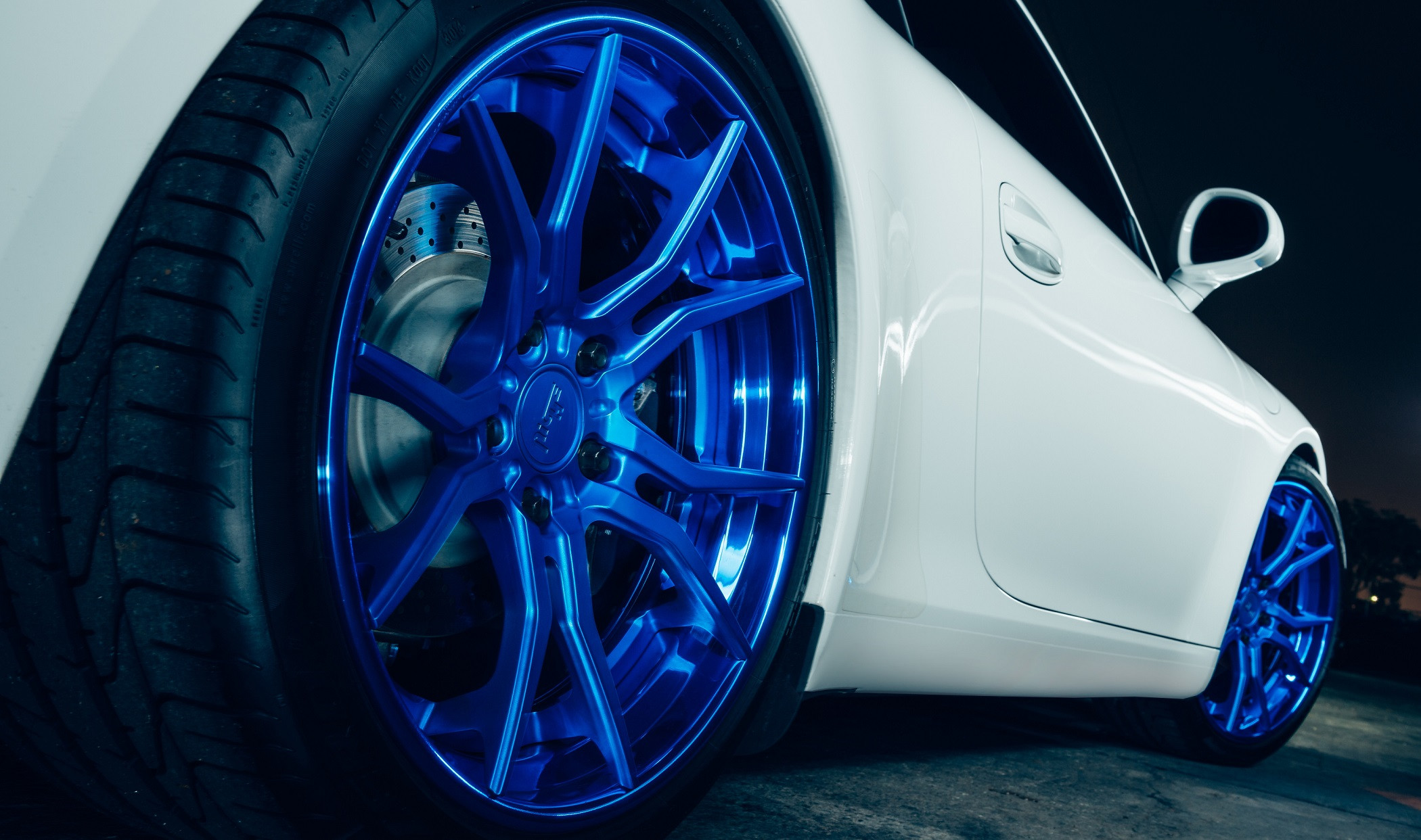 White Porsche 911 with Matte Blue Niche Wheels - Photo by Niche
