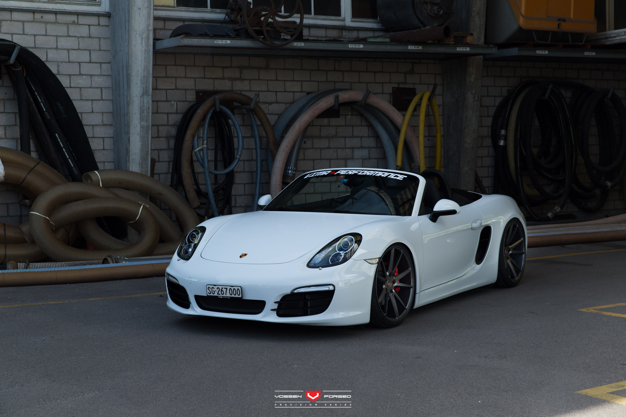 White Porsche Boxster with Custom Headlights - Photo by Vossen
