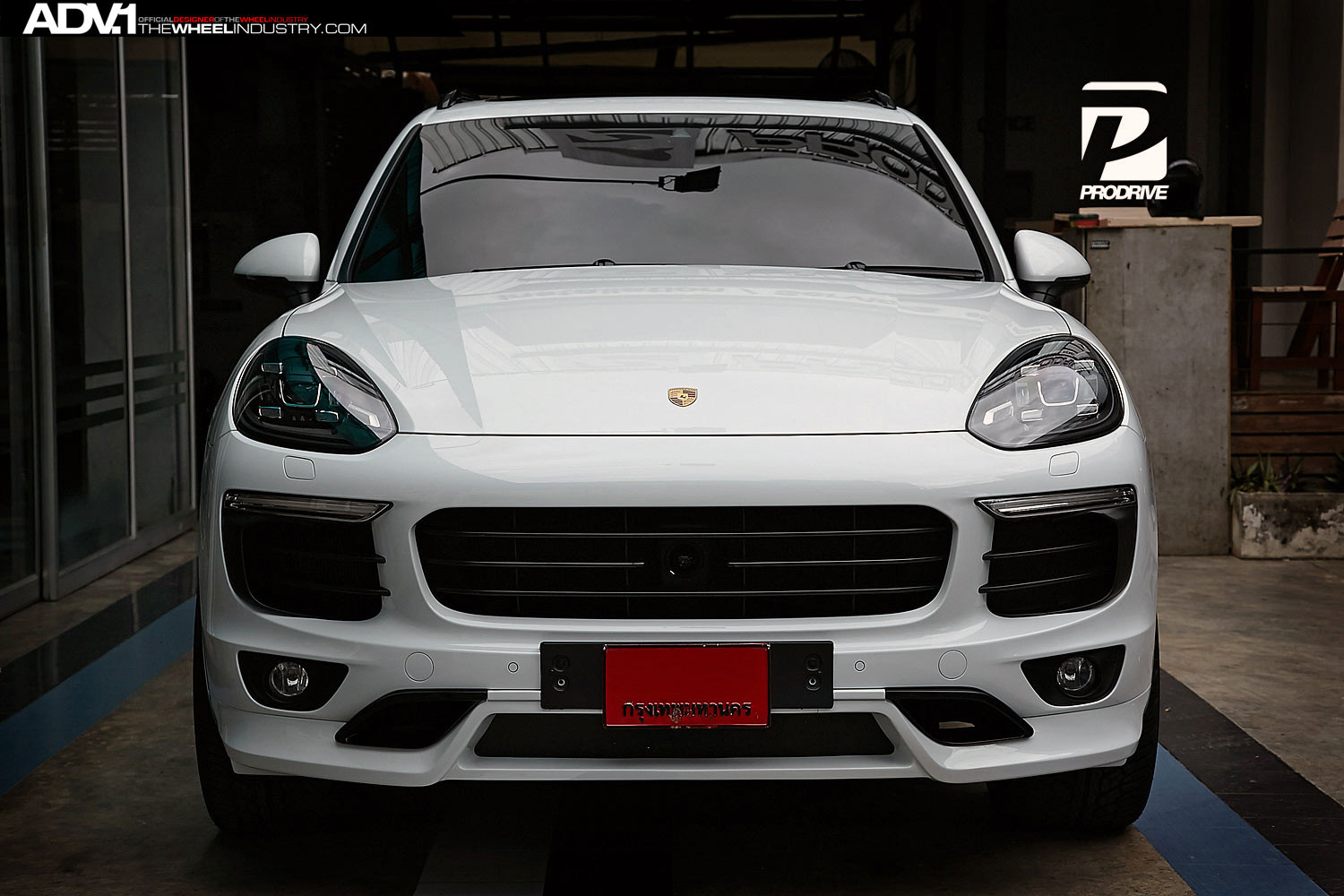 Aftermarket Front Bumper on White Porsche Cayenne - Photo by ADV.1