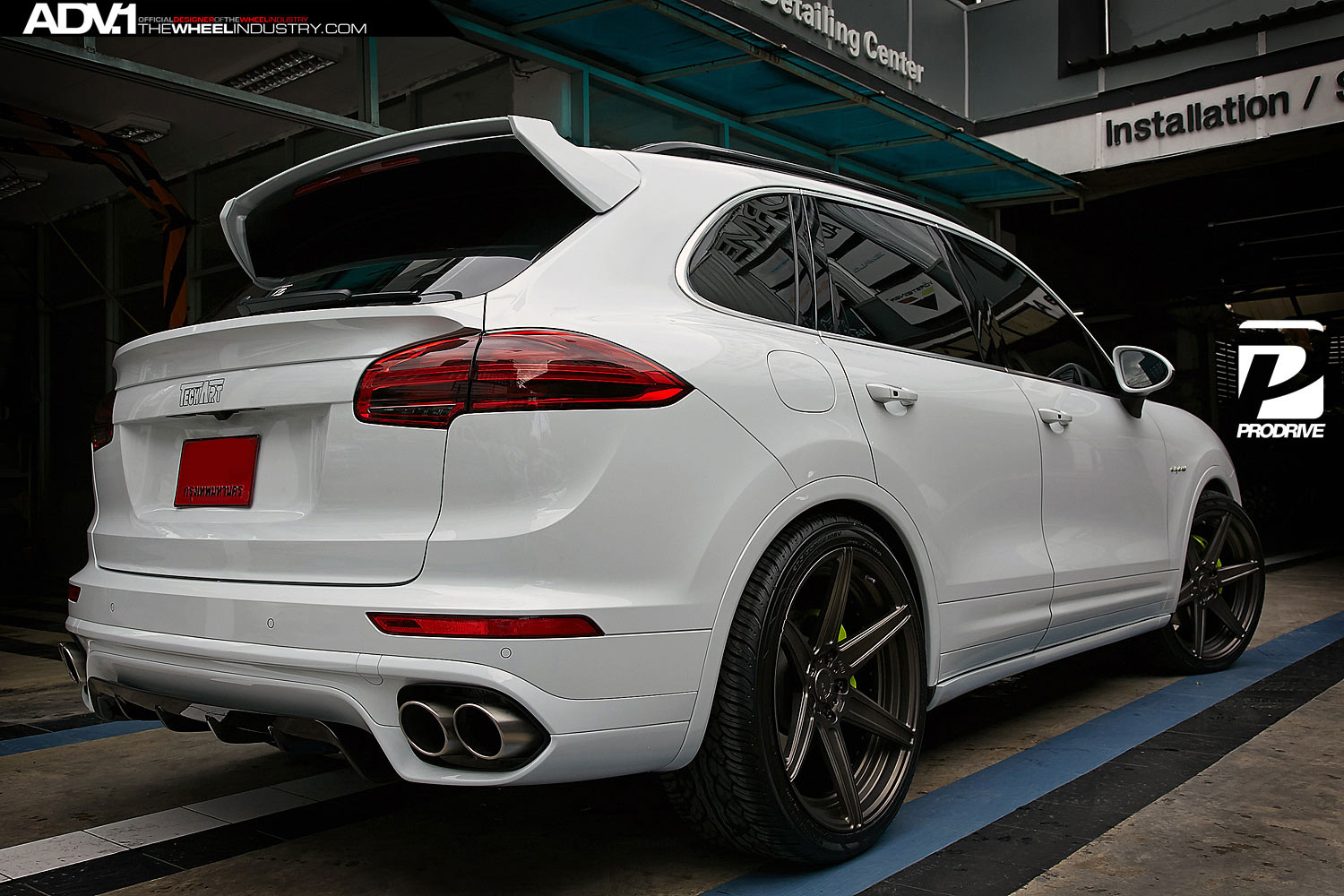 White Porsche Cayenne with Large Roofline Spoiler - Photo by ADV.1