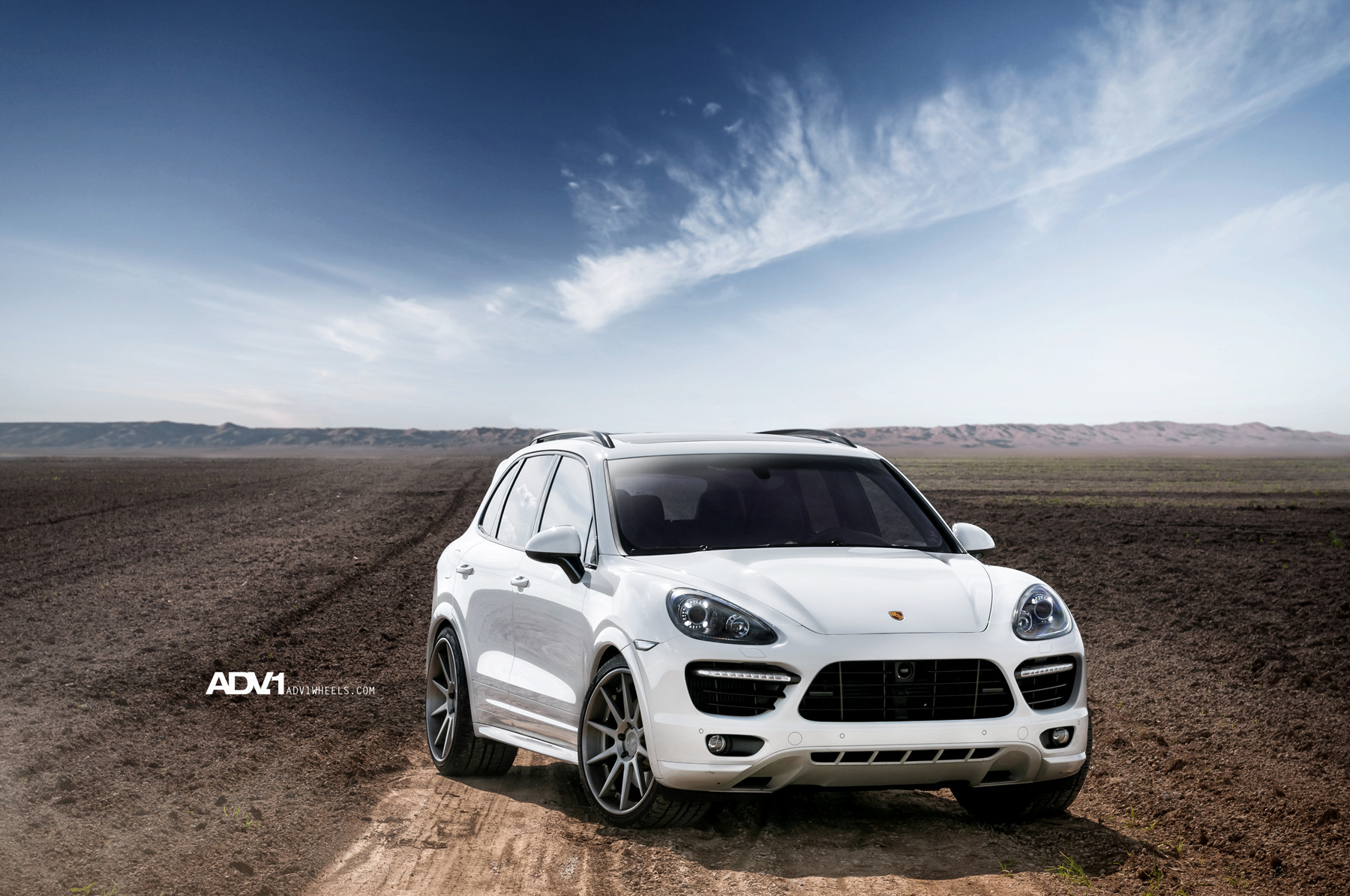 White Porsche Cayenne with Custom Front Bumper Cover - Photo by ADV.1