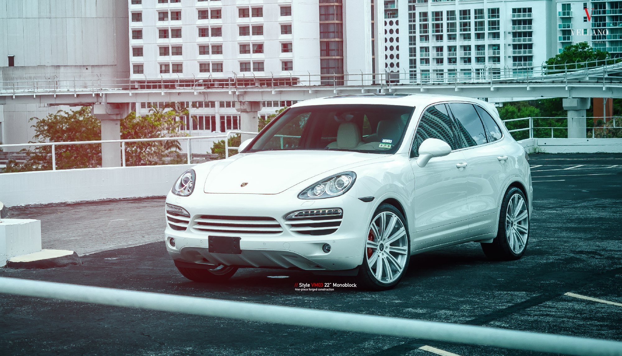 White Porsche Cayenne with Custom Bumper Guard - Photo by Vellano