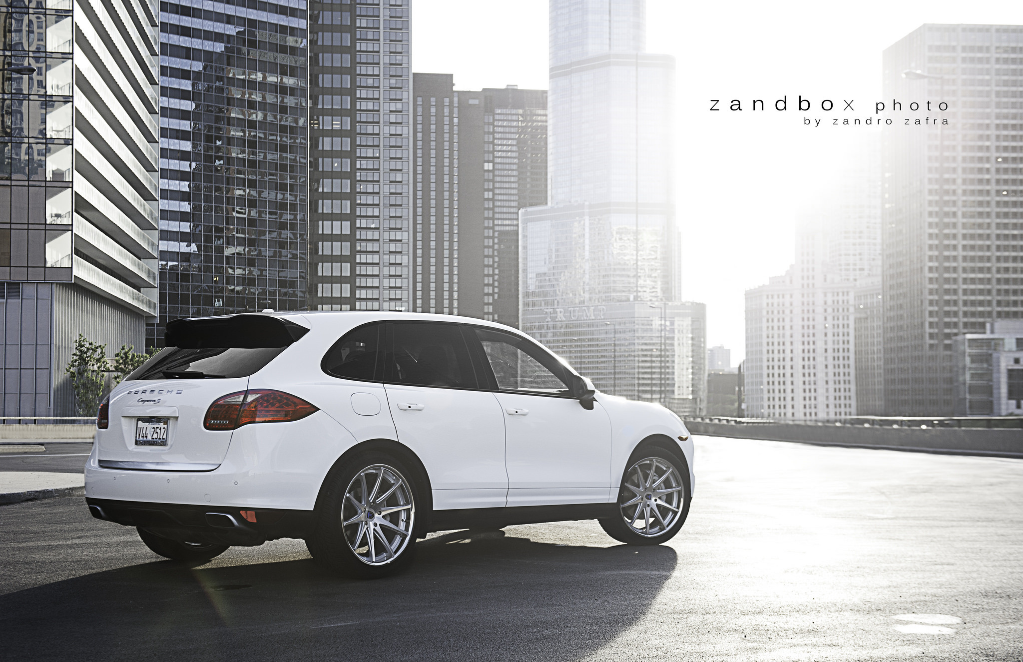 White Porsche Cayenne with Large Roofline Spoiler - Photo by zandbox