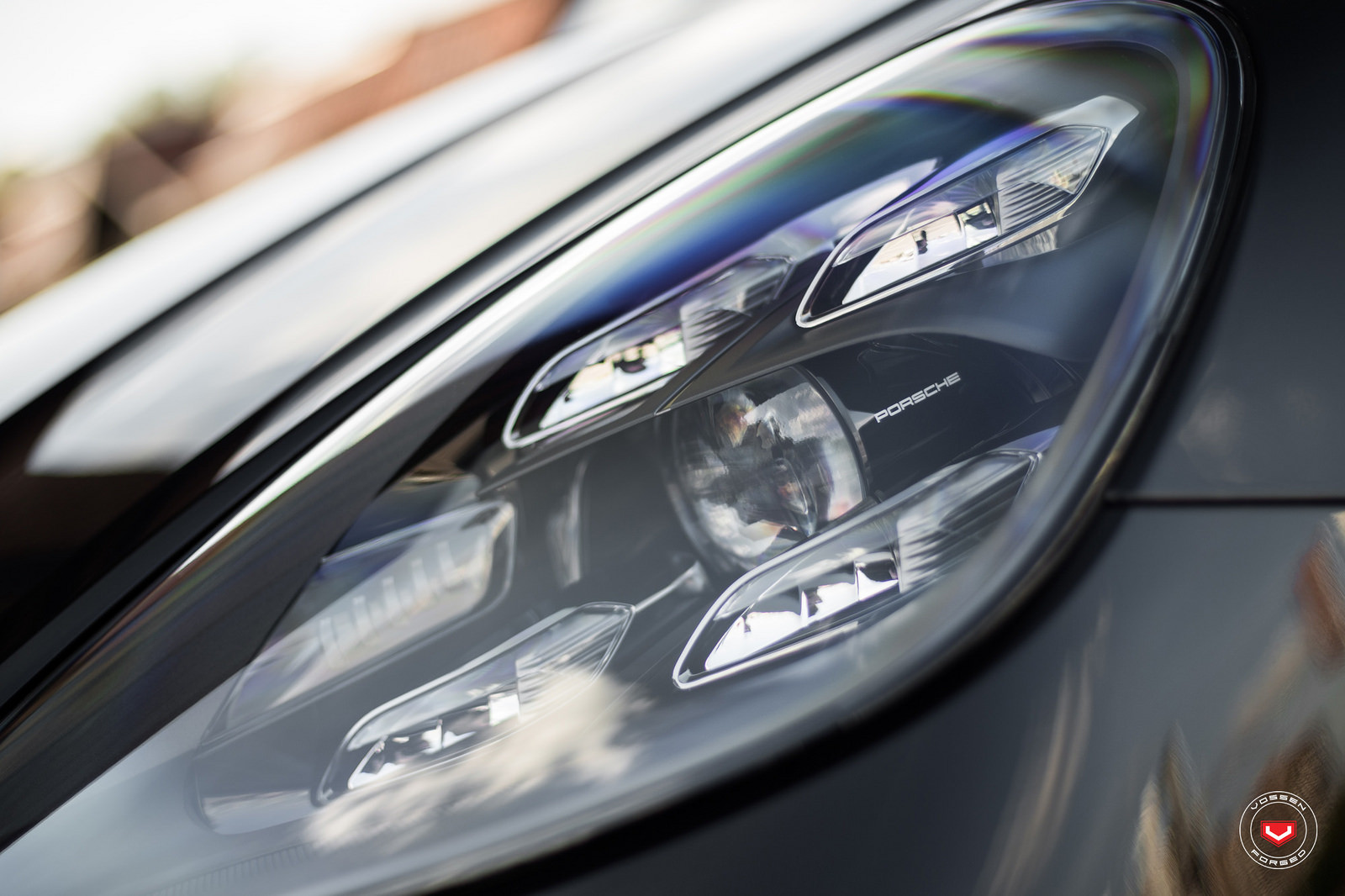 Black Porsche Cayenne with Custom Projector Headlights - Photo by Vossen
