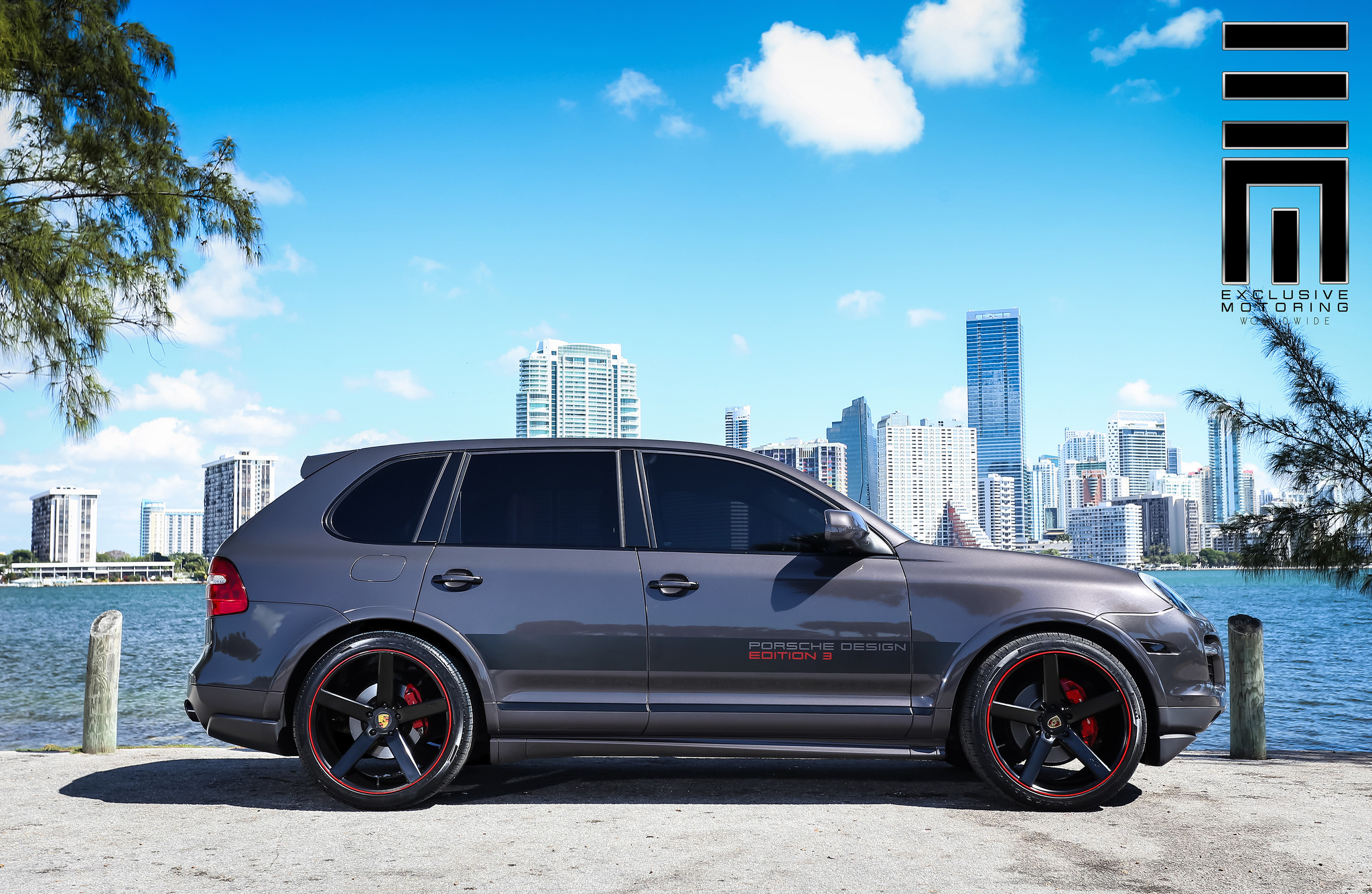 Lowered Porsche Cayenne On Black Rims With Red Accents - Photo by Exclusive Motoring