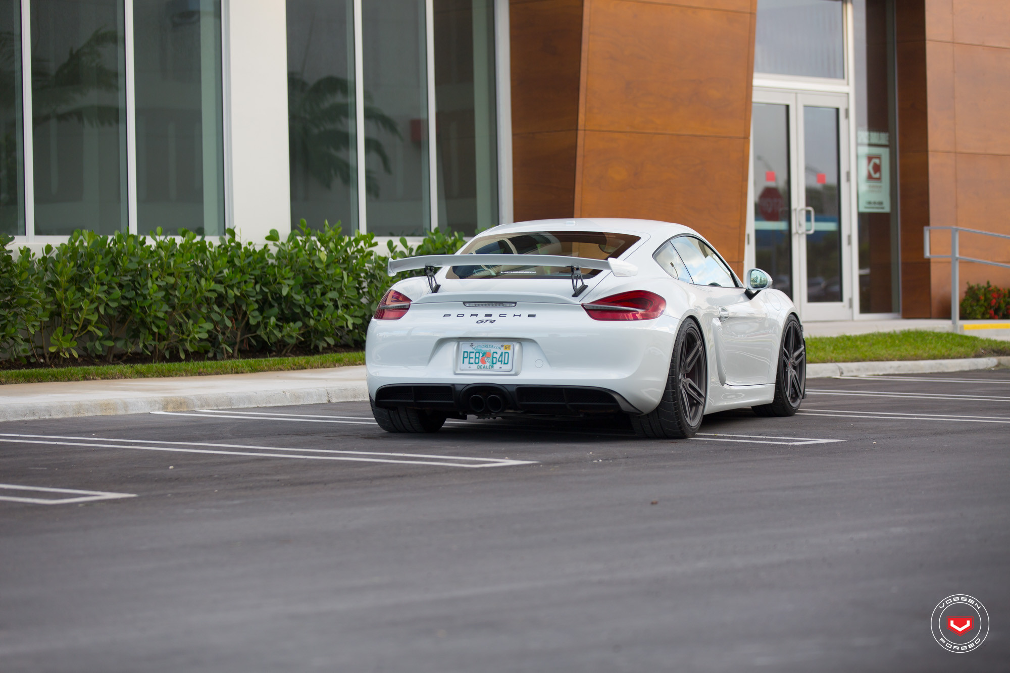 White Porsche Cayman with Large Wing Spoiler - Photo by Vossen