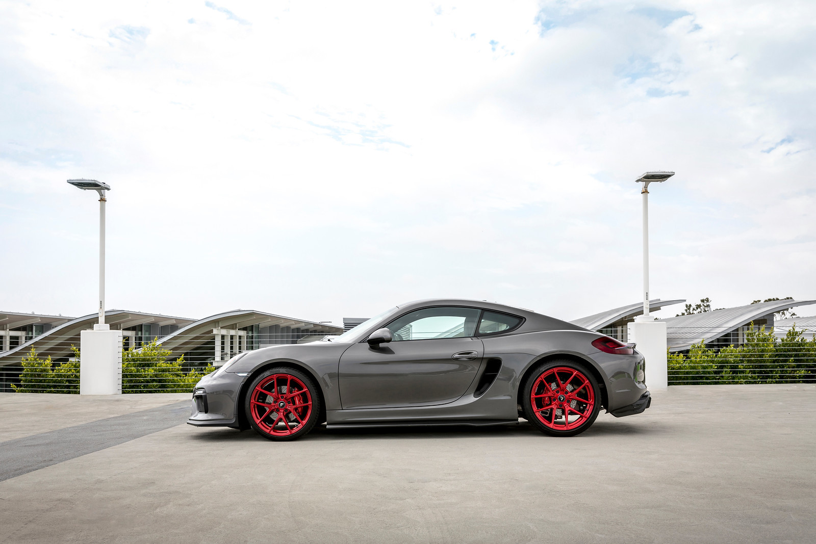 Aftermarket Side Skirts on Gray Porsche Cayman - Photo by Vorstiner