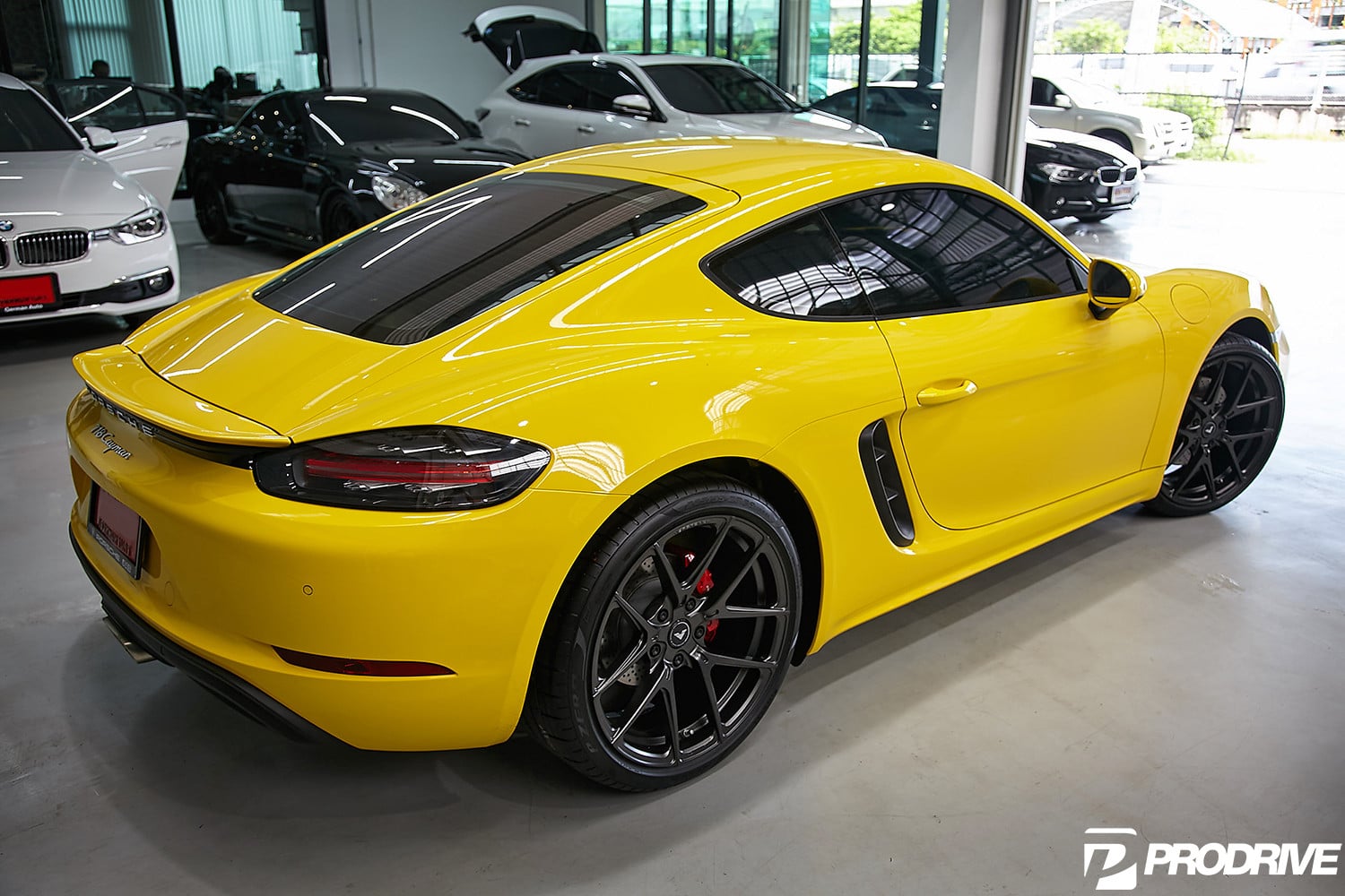 Yellow Porsche Cayman with Red Smoke LED Taillights - Photo by Vorstiner