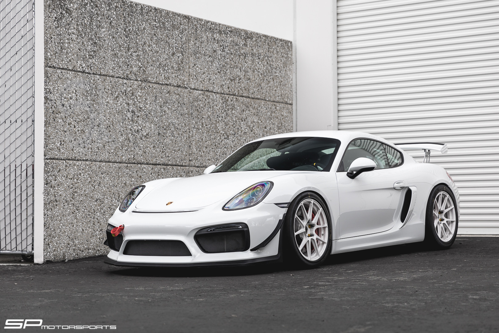 White Porsche Cayman with Custom Front Bumper - Photo by Forgeline Motorsports