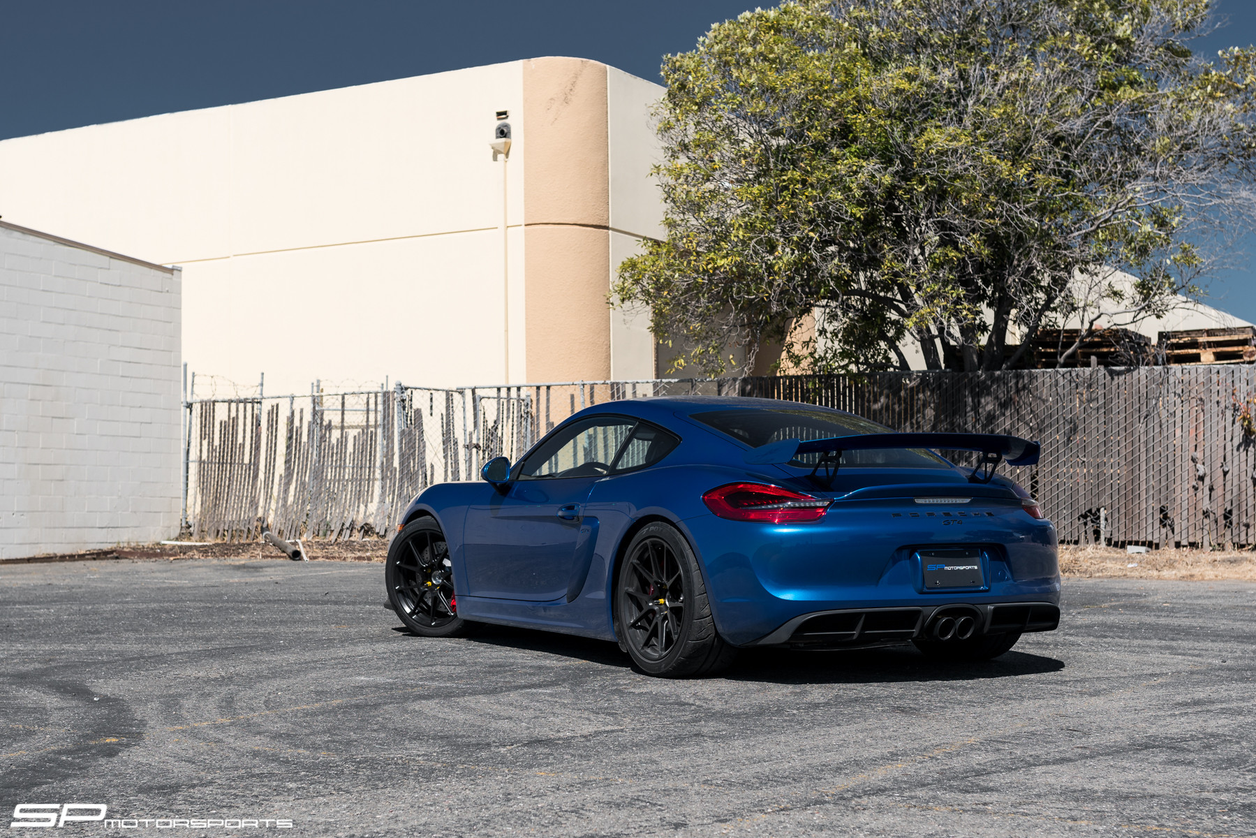 Matte Black Forgeline Rims on Blue Porsche Cayman - Photo by Forgeline Motorsports
