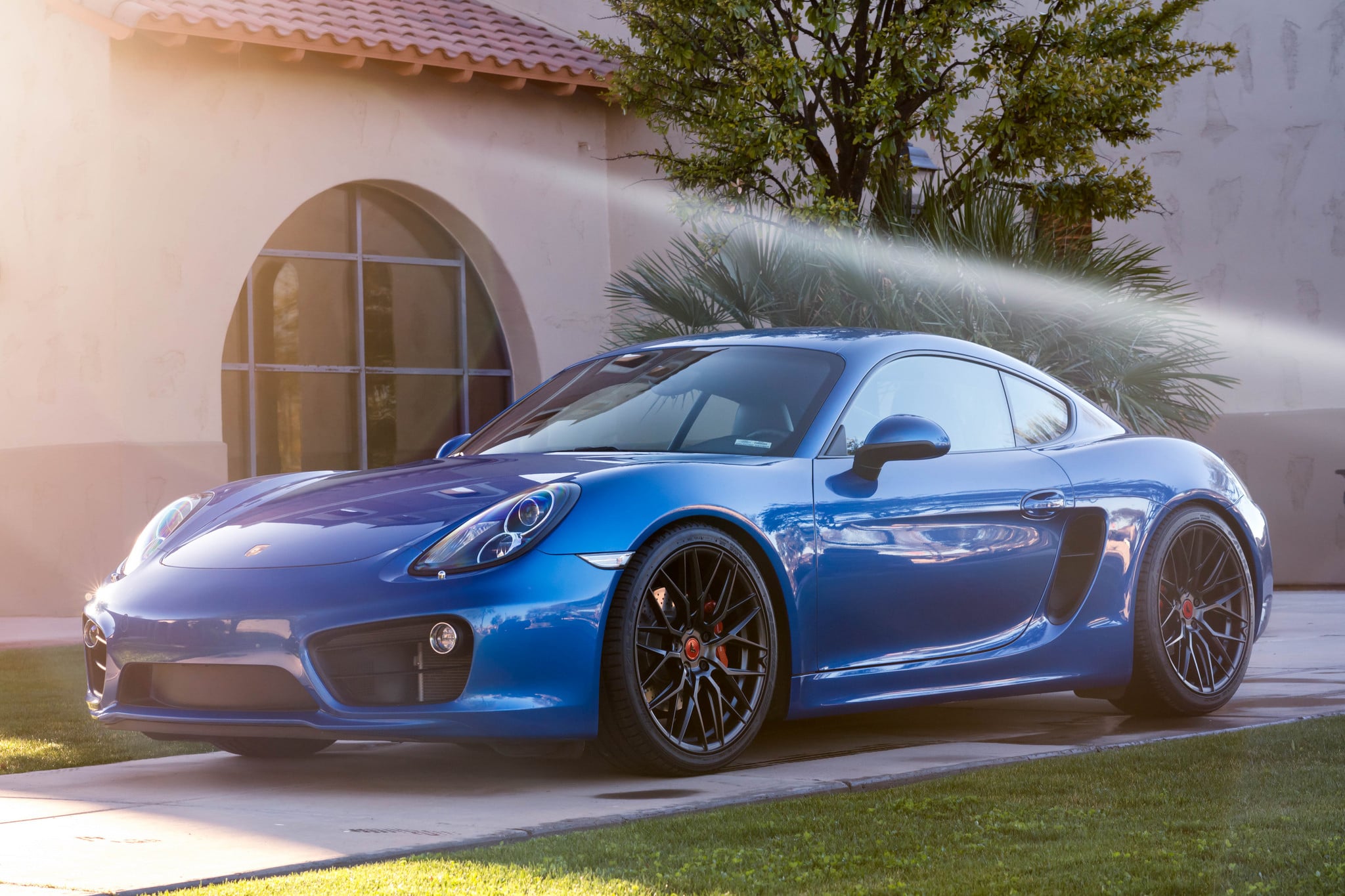 Front Bumper with Fog Lights on Blue Porsche Cayman - Photo by Vorsteiner