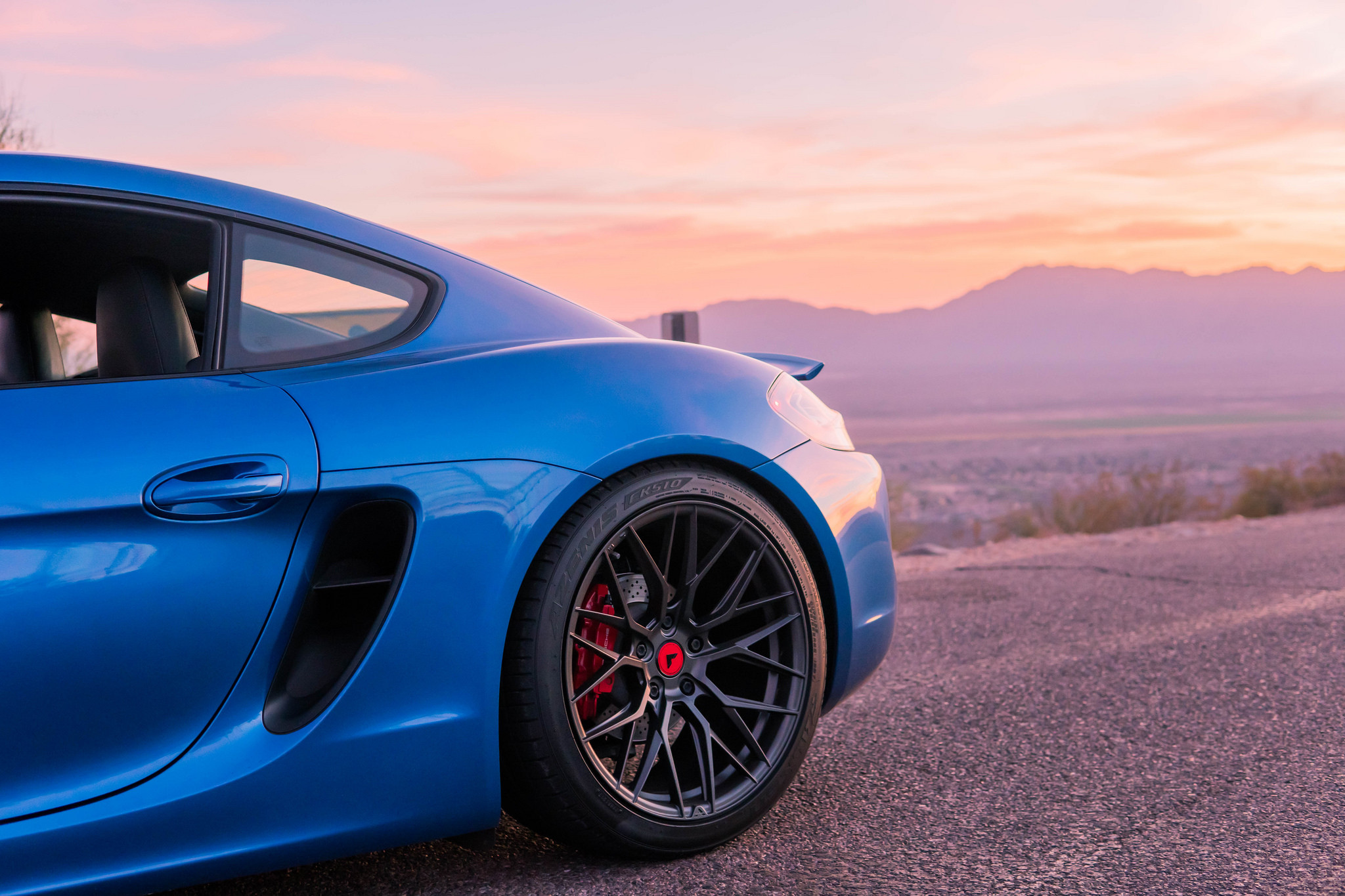 Blue Porsche Cayman with Custom Vorsteiner Wheels - Photo by Vorsteiner