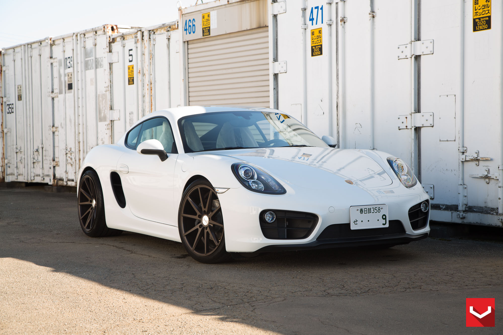White Porsche Cayman with Custom Headlights - Photo by Vossen