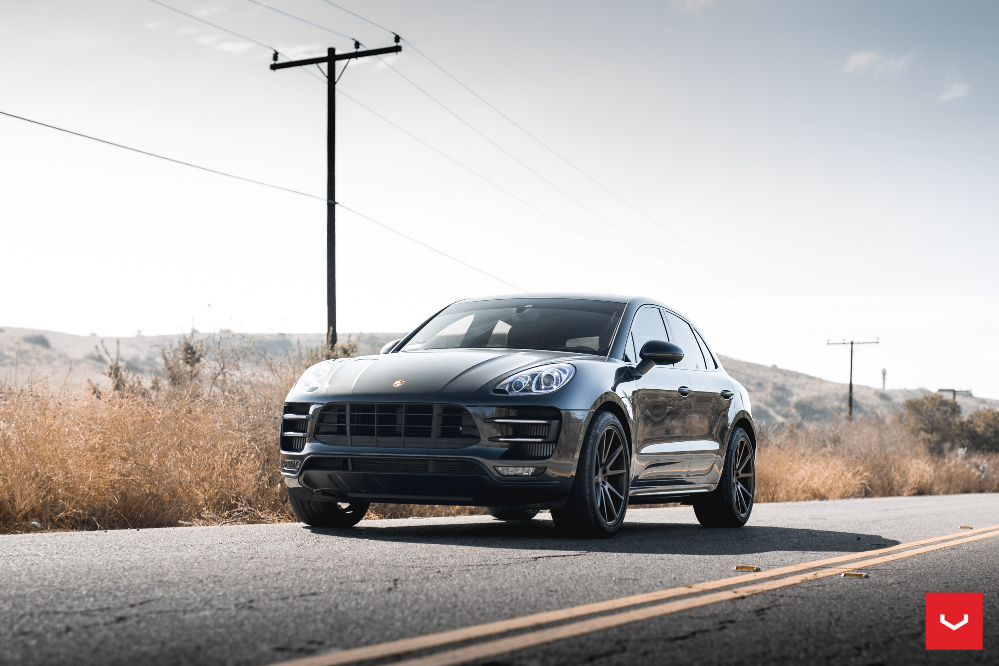 Custom Halo Headlights on Black Porsche Macan - Photo by Vossen
