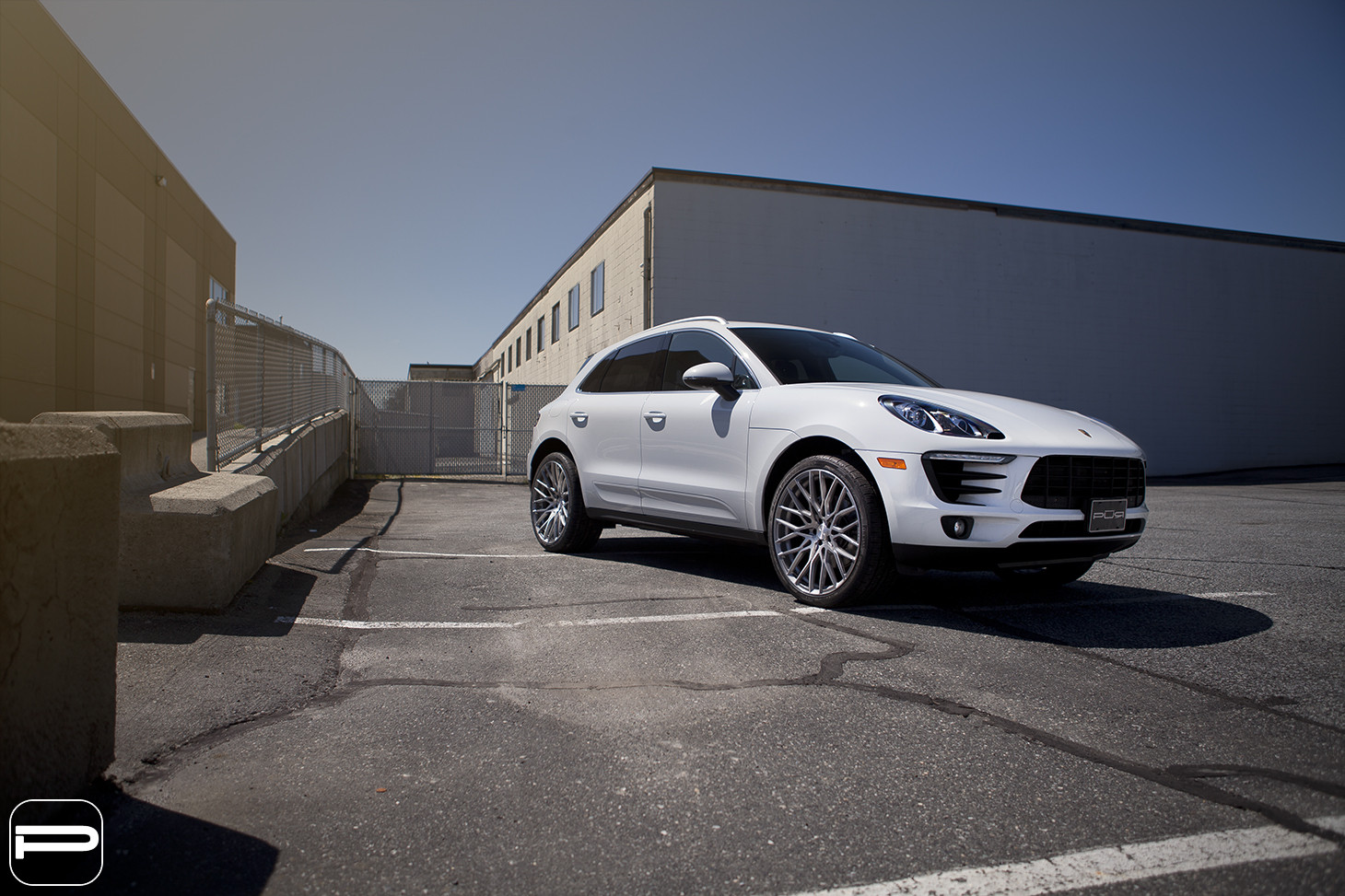 Front Bumper with Fog Lights on White Porsche Macan - Photo by PUR Wheels