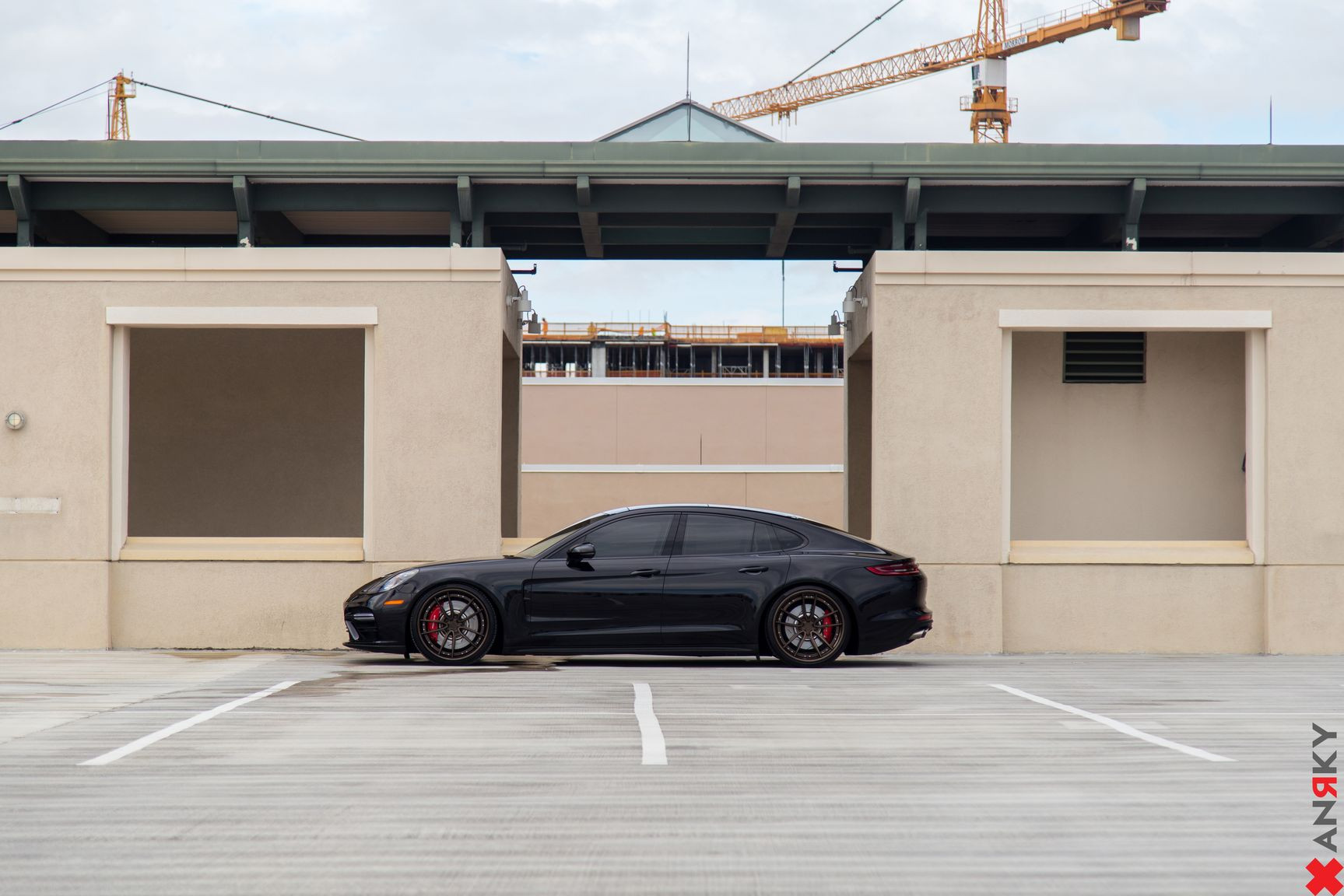 Aftermarket Side Skirts on Black Porsche Panamera - Photo by Anrky Wheels