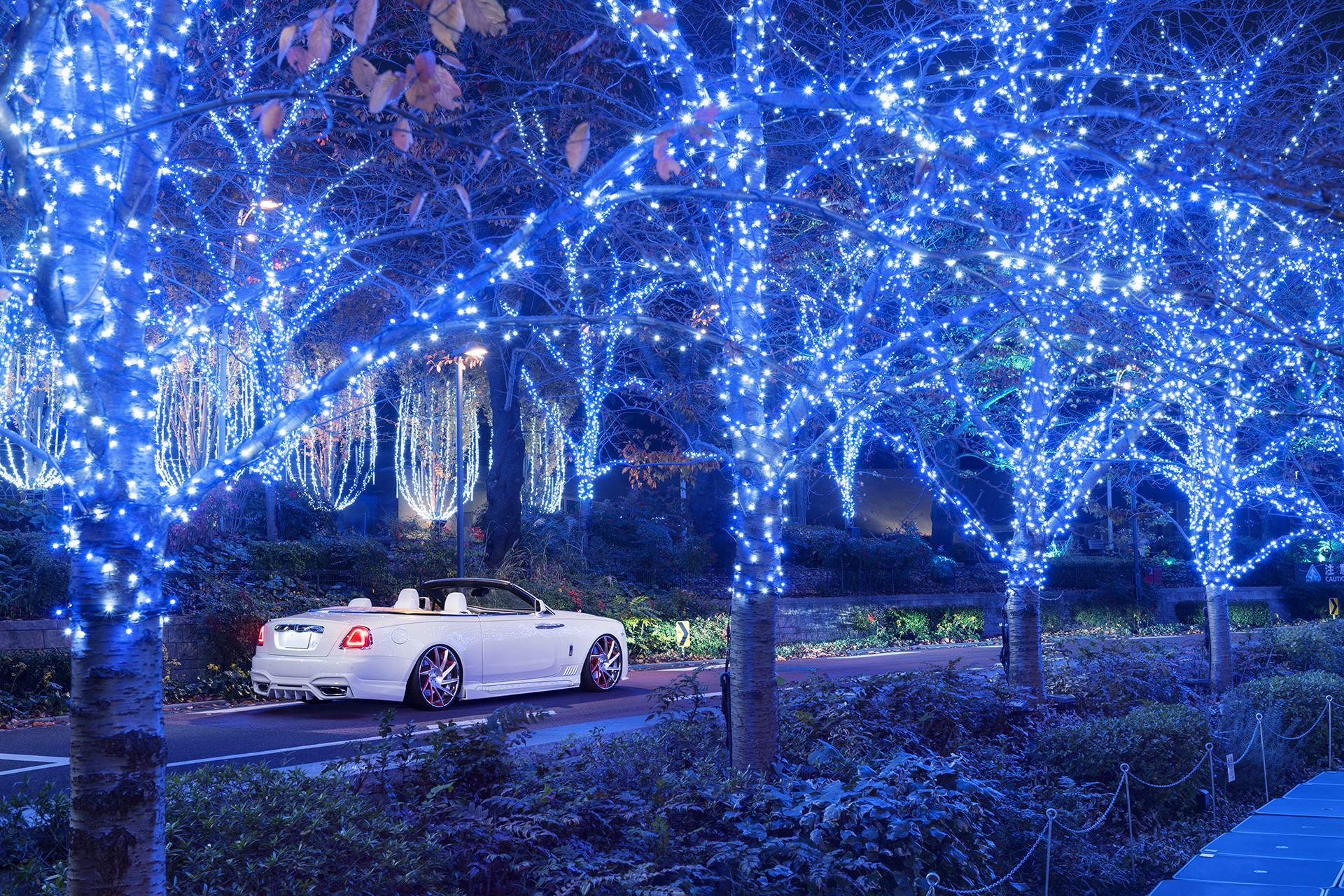 White Convertible Rolls Royce Dawn with Red LED Taillights - Photo by Forgiato