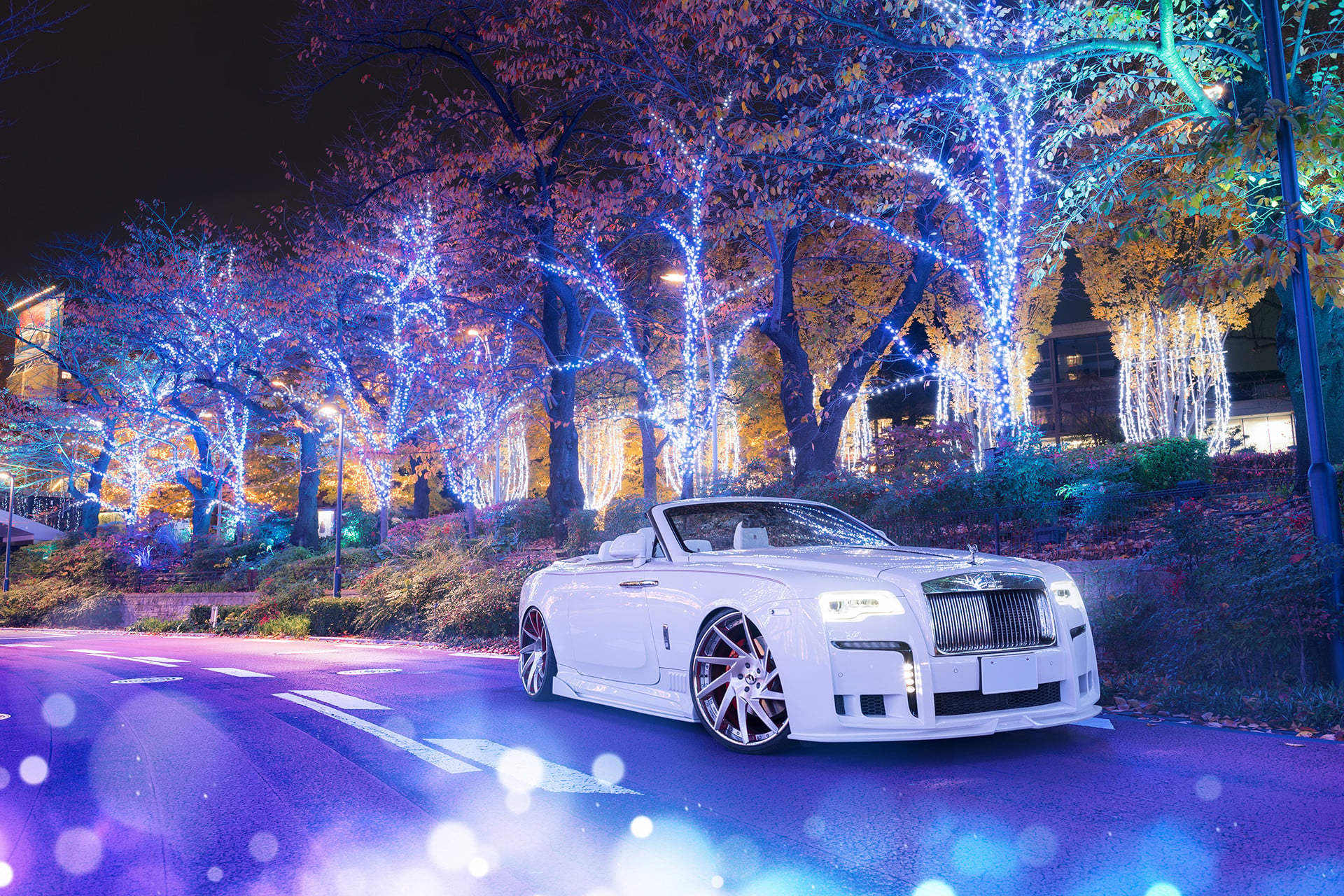 White Convertible Rolls Royce Dawn with Custom Front Bumper - Photo by Forgiato