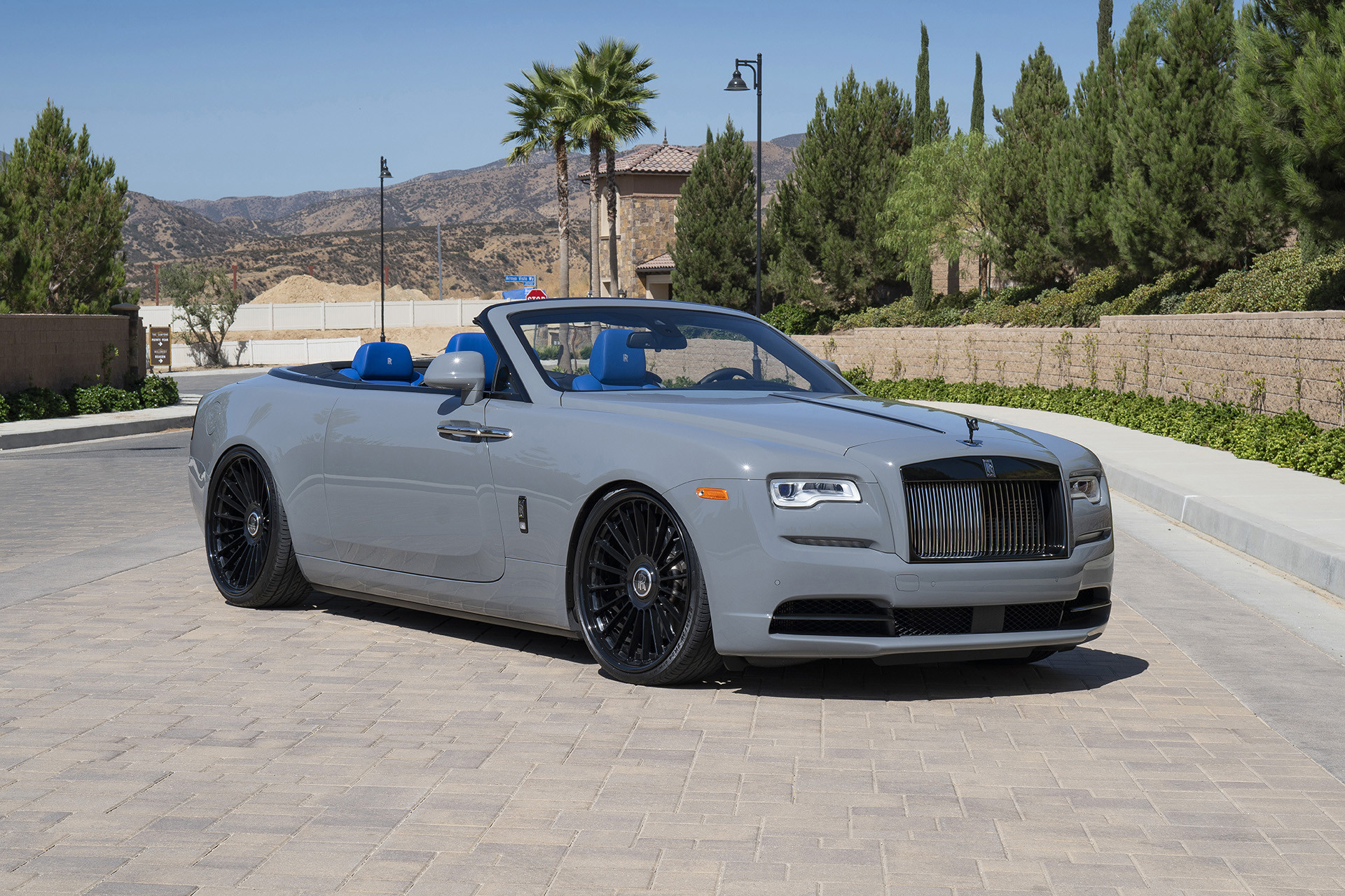 Custom Emblem on Gray Convertible Rolls Royce Dawn - Photo by Forgiato