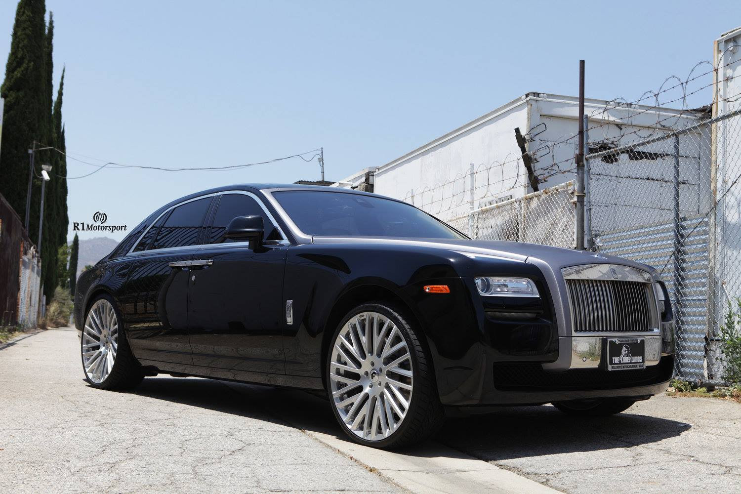 Black Rolls Royce Ghost with Chrome Billet Grille - Photo by Forgiato
