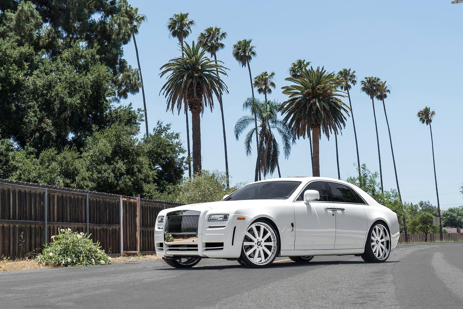 Custom White Rolls Royce Ghost with Chrome Grille - Photo by Forgiato