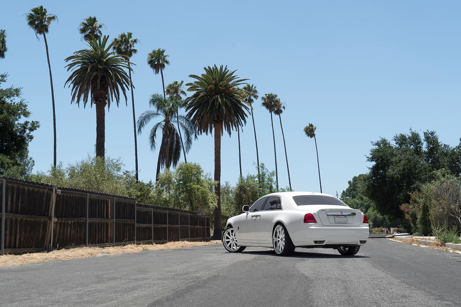 Aftermarket Rear Diffuser on White Rolls Royce Ghost - Photo by Forgiato