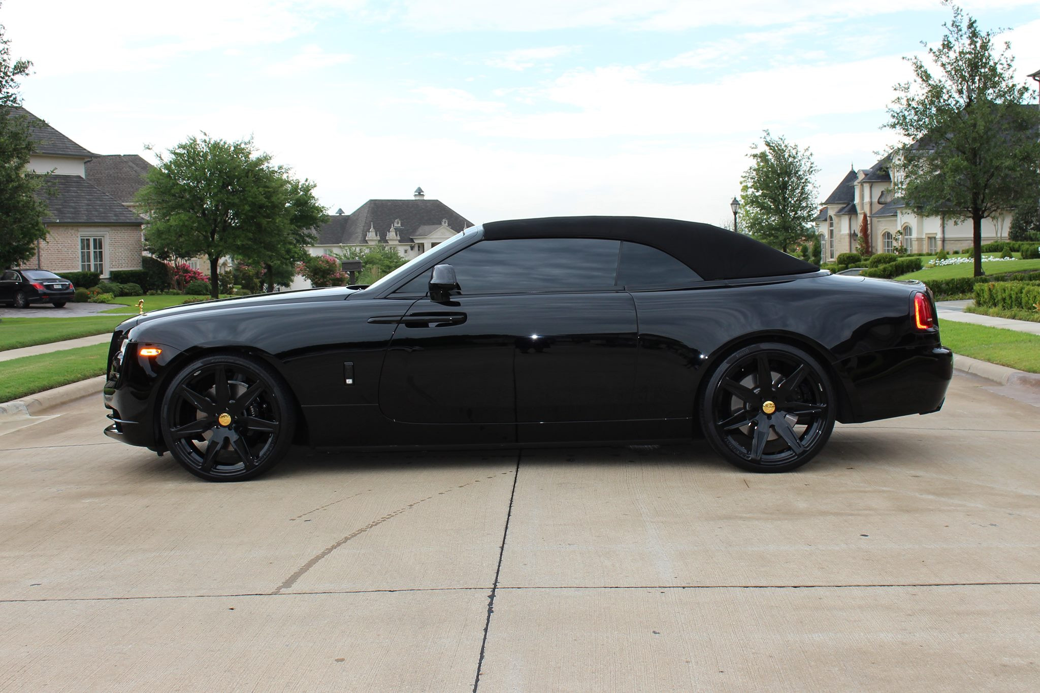 Aftermarket Side Skirts on Black Rolls Royce Wraith - Photo by Forgiato