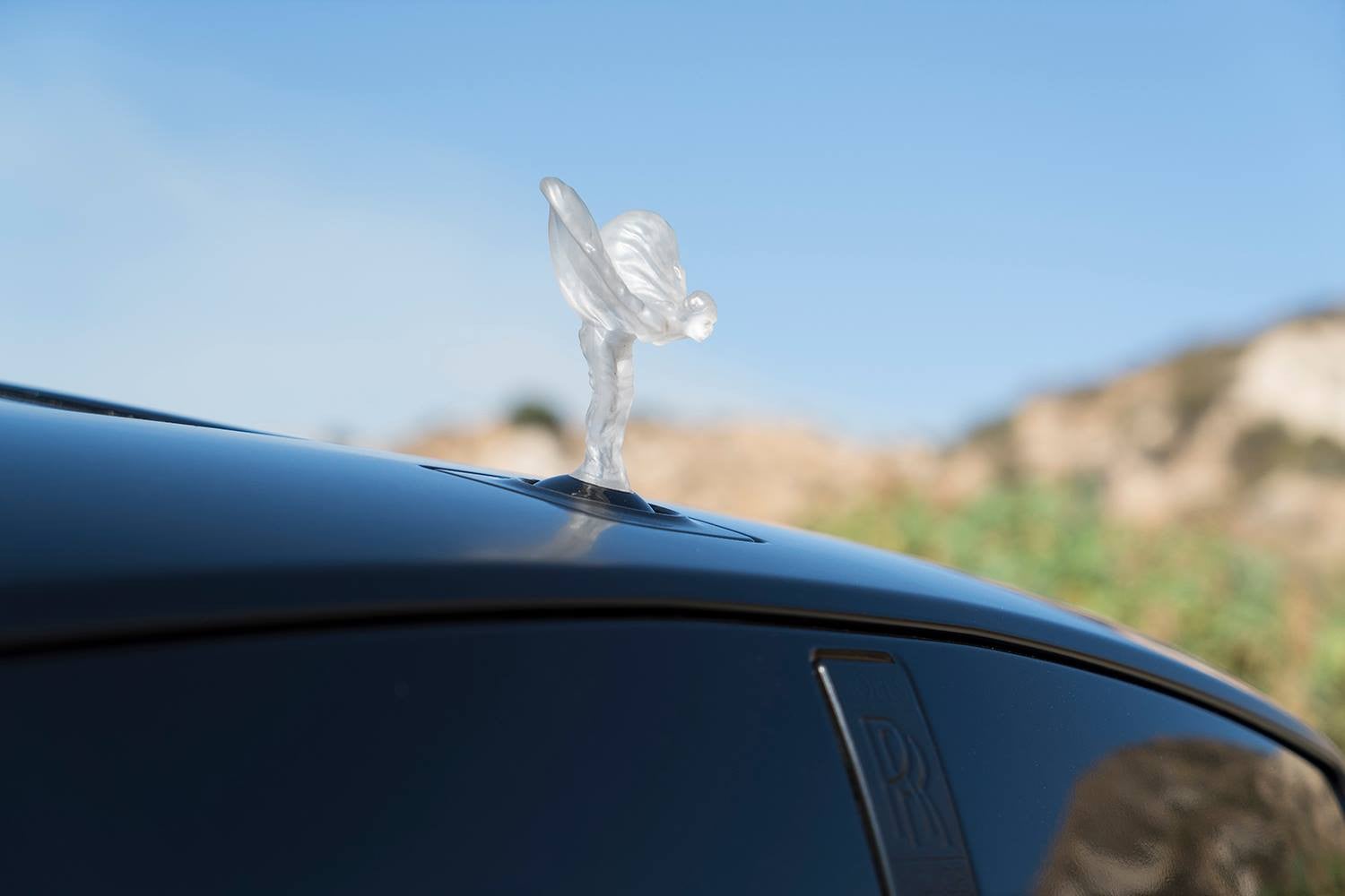 Black Rolls Royce Wraith with Custom Logo - Photo by Forgiato