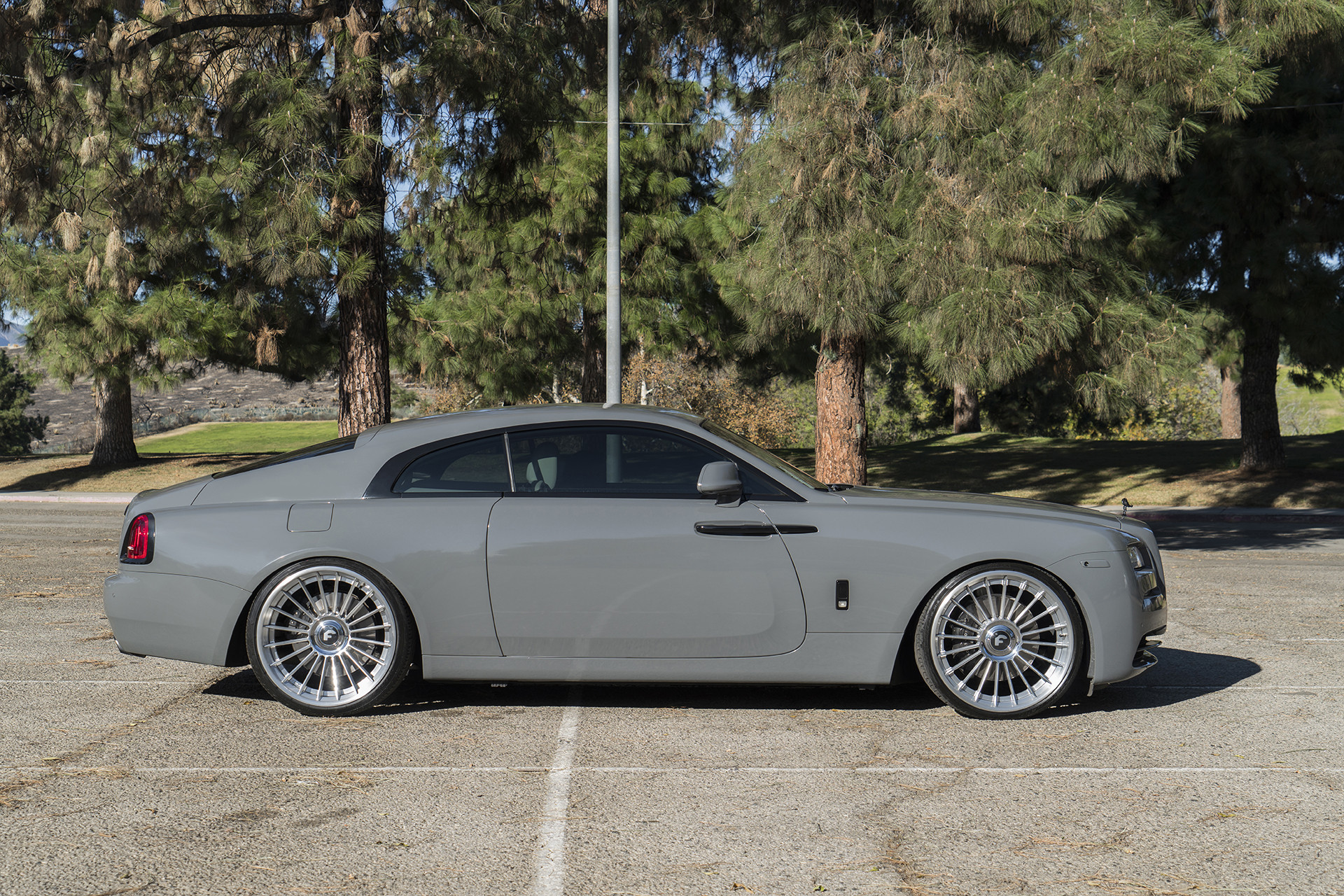 Aftermarket Side Skirts on Gray Rolls Royce Wraith - Photo by Forgiato
