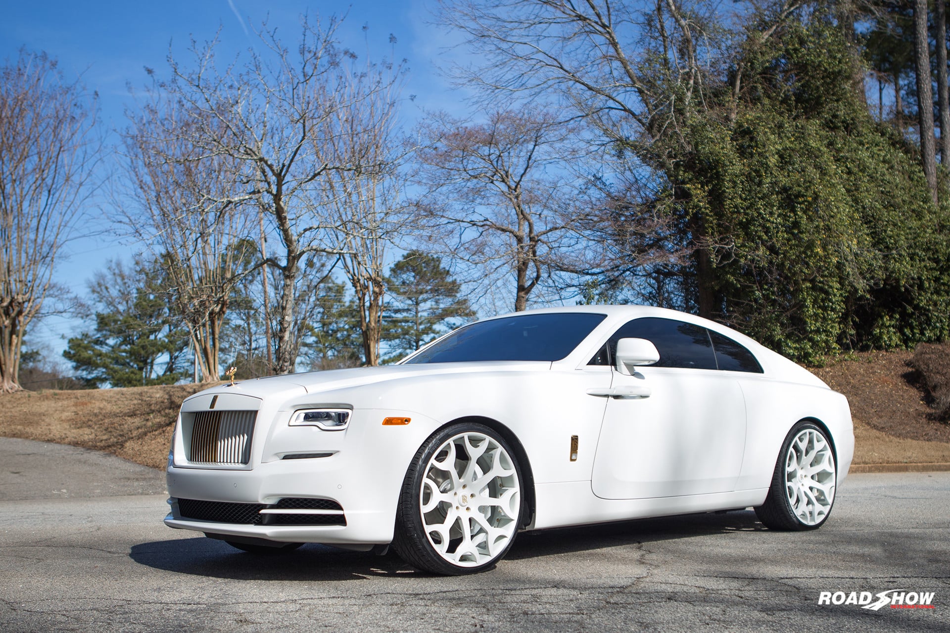 White Rolls Royce Wraith with Custom Front Bumper - Photo by Forgiato