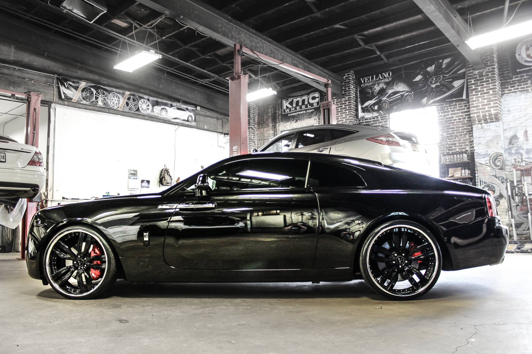 Aftermarket Side Skirts on Black Rolls Royce Wraith - Photo by Vellano